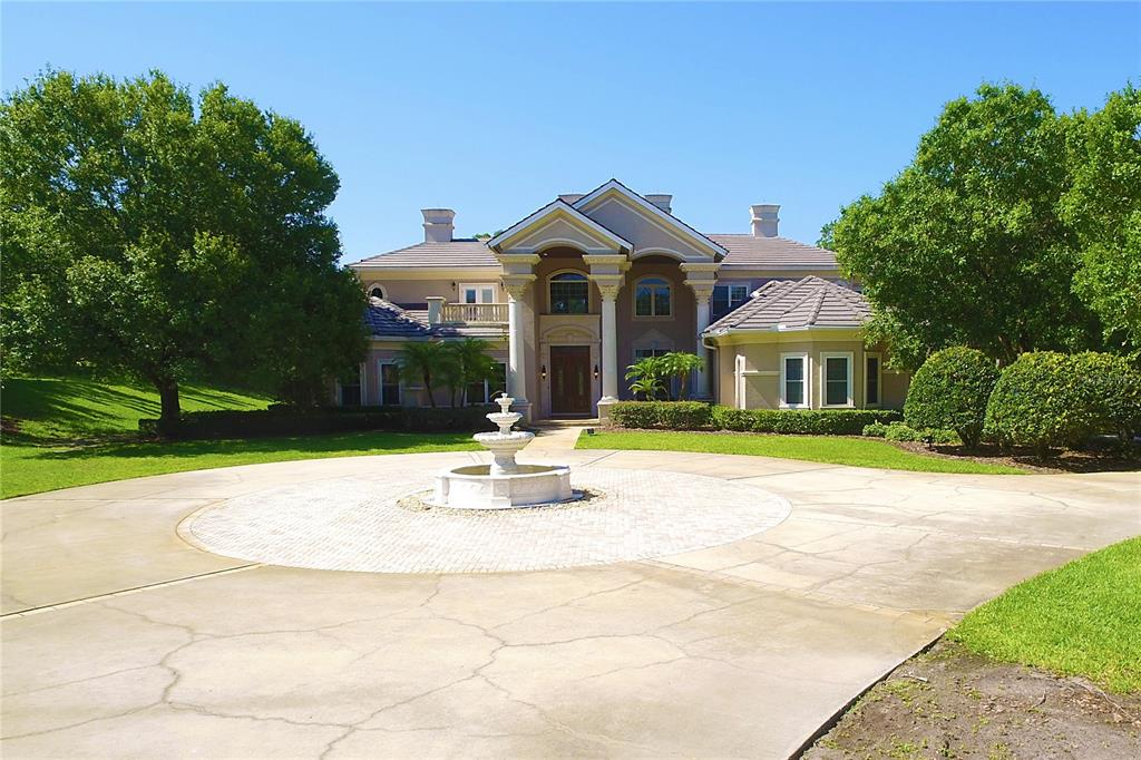 3315 Enterprise Road East Safety Harbor, FL 34695 - Photo 1 of 1 a front view of a house with a yard