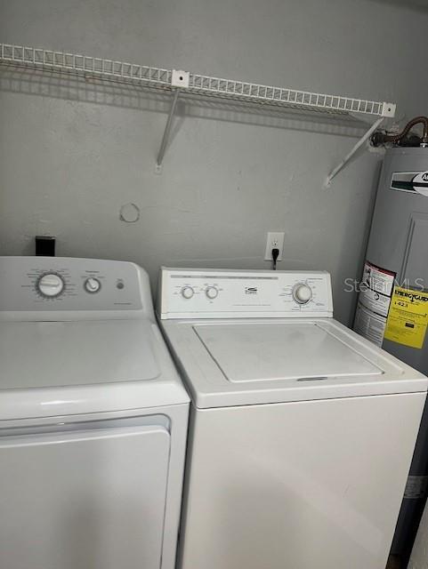 3600 Southwest 19th Avenue, Unit 41D Gainesville, FL 32607 - Photo 13 of 23 a utility room with dryer and washer