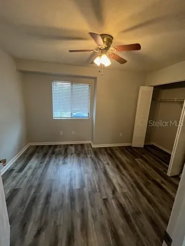 a room with a bed and a window