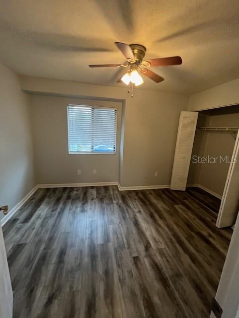 3600 Southwest 19th Avenue, Unit 41D Gainesville, FL 32607 - Photo 19 of 23 a view of an empty room with wooden floor and a window
