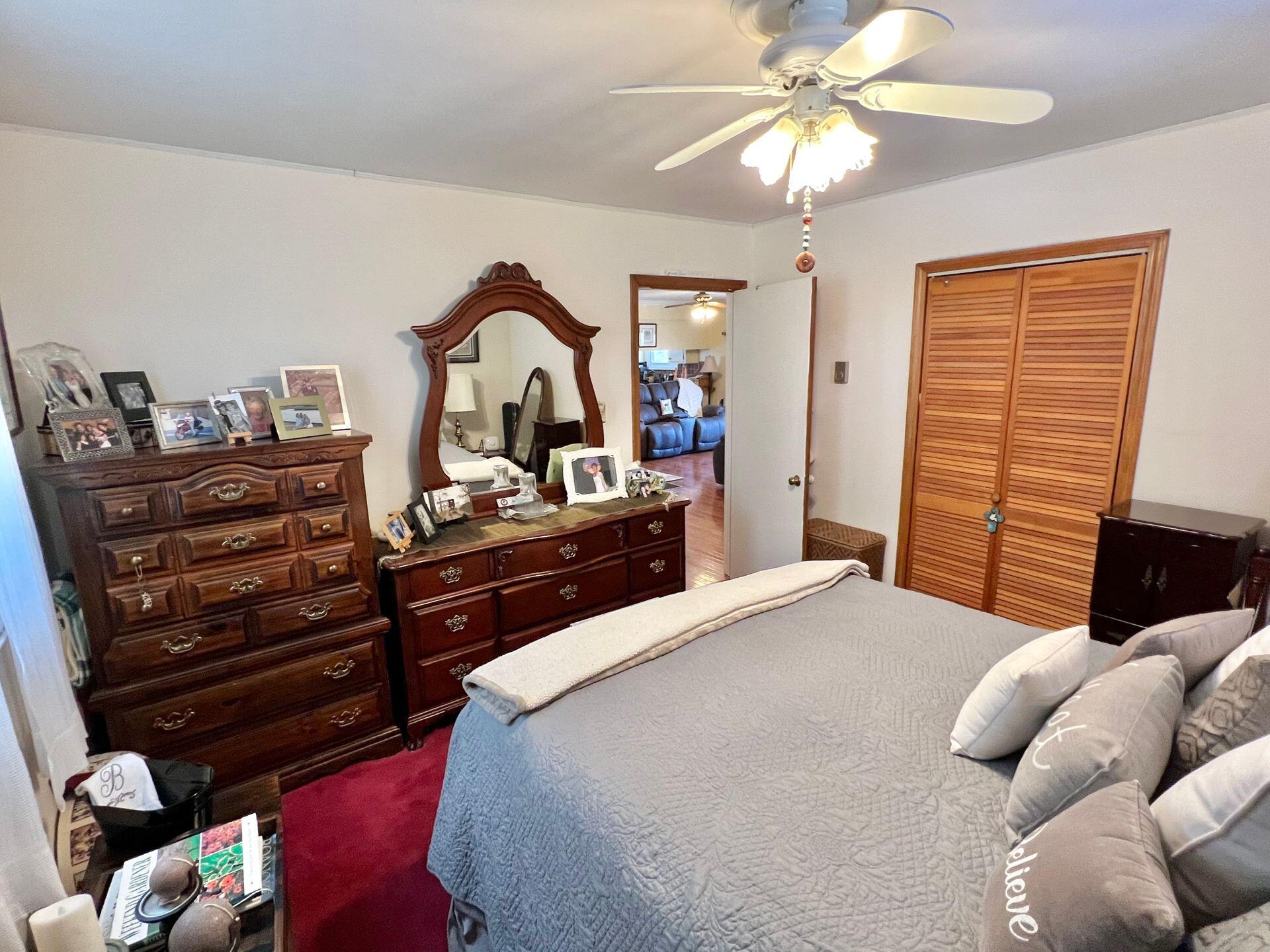 4503 Keefer Road Roanoke, VA 24018 - Photo 21 of 92 a bedroom with furniture and a chandelier