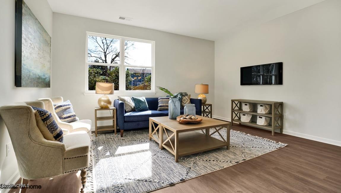 9044 St George Road, Unit LOT 25 Wilmington, NC 28411 - Photo 11 of 55 A bright comfortable living area is big enough for plenty of furniture