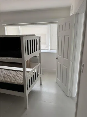 an empty room with window