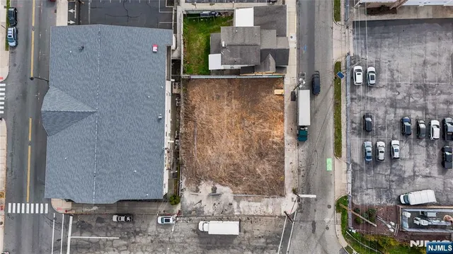 a view of building and car parked