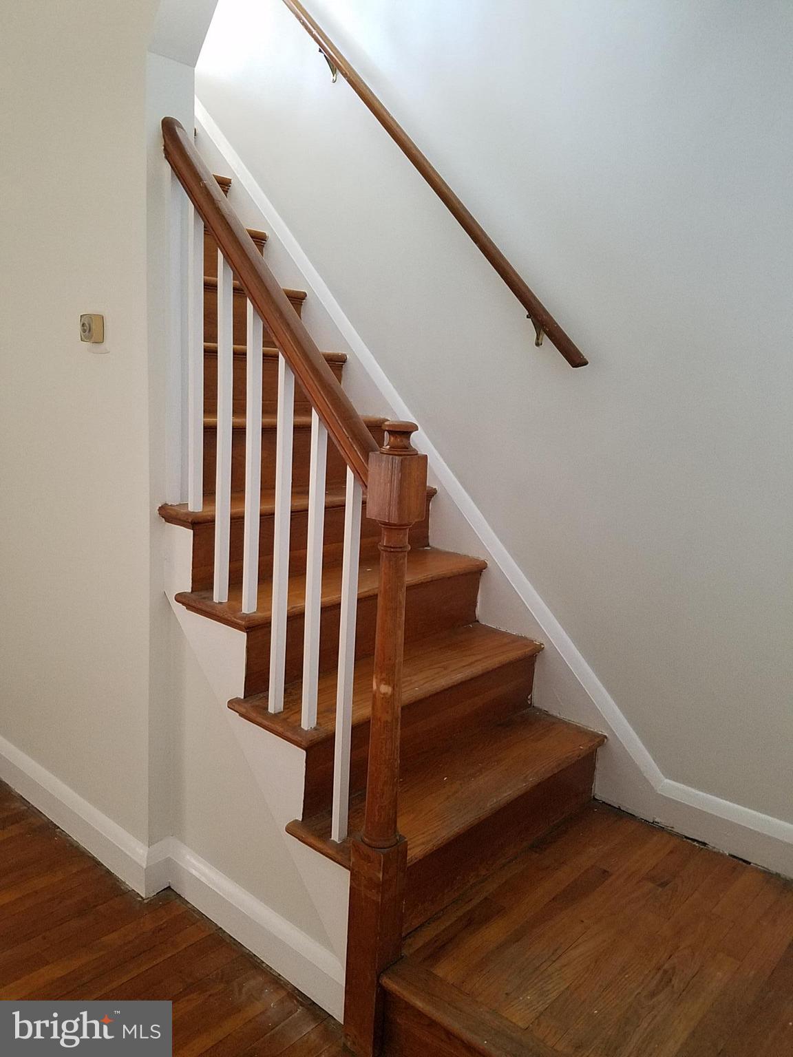 3907 Colchester Road Baltimore, MD 21229 - Photo 22 of 30 a view of entryway with wooden floor