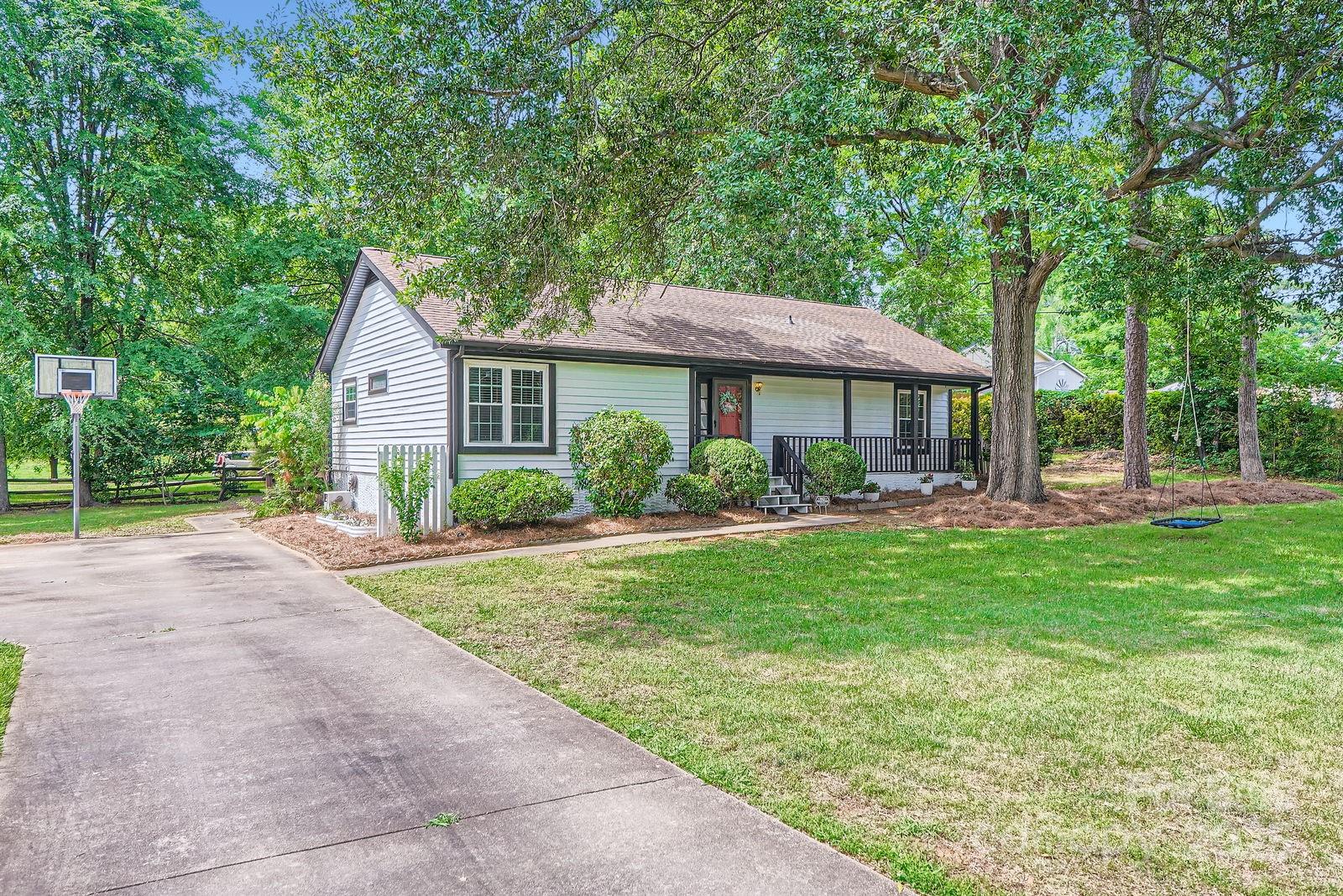 2009 Pinevalley Road Rock Hill, SC 29732 - Photo 2 of 27 a front view of a house with a garden