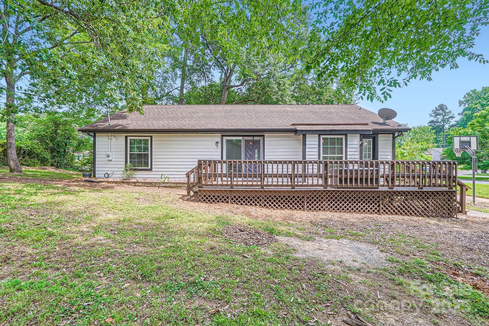 2009 Pinevalley Road Rock Hill, SC 29732 - Photo 25 of 27 a front view of a house with a yard table and chairs