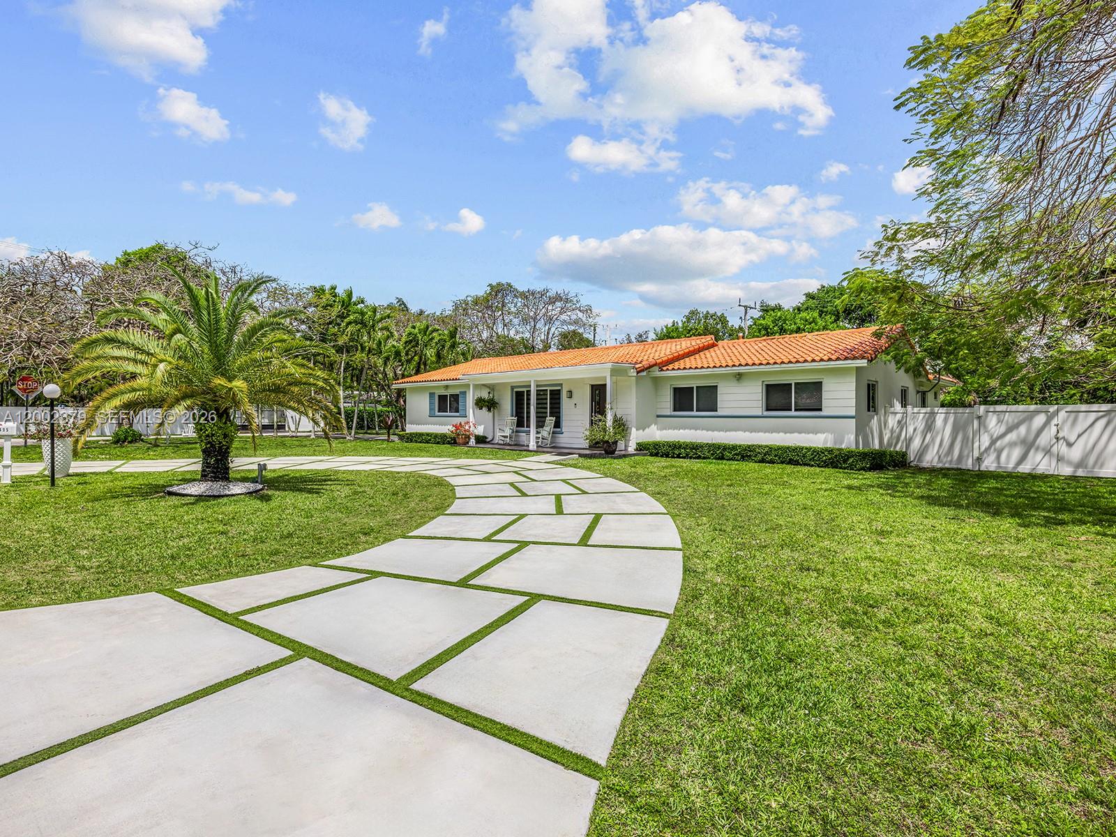 7495 Southwest 73rd Terrace Miami, FL 33143 - Photo 3 of 33 a view of house with a yard
