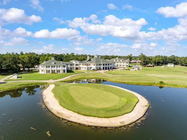 a view of a swimming pool and lake view