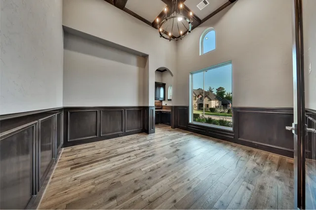 a view of livingroom and kitchen with wooden floor