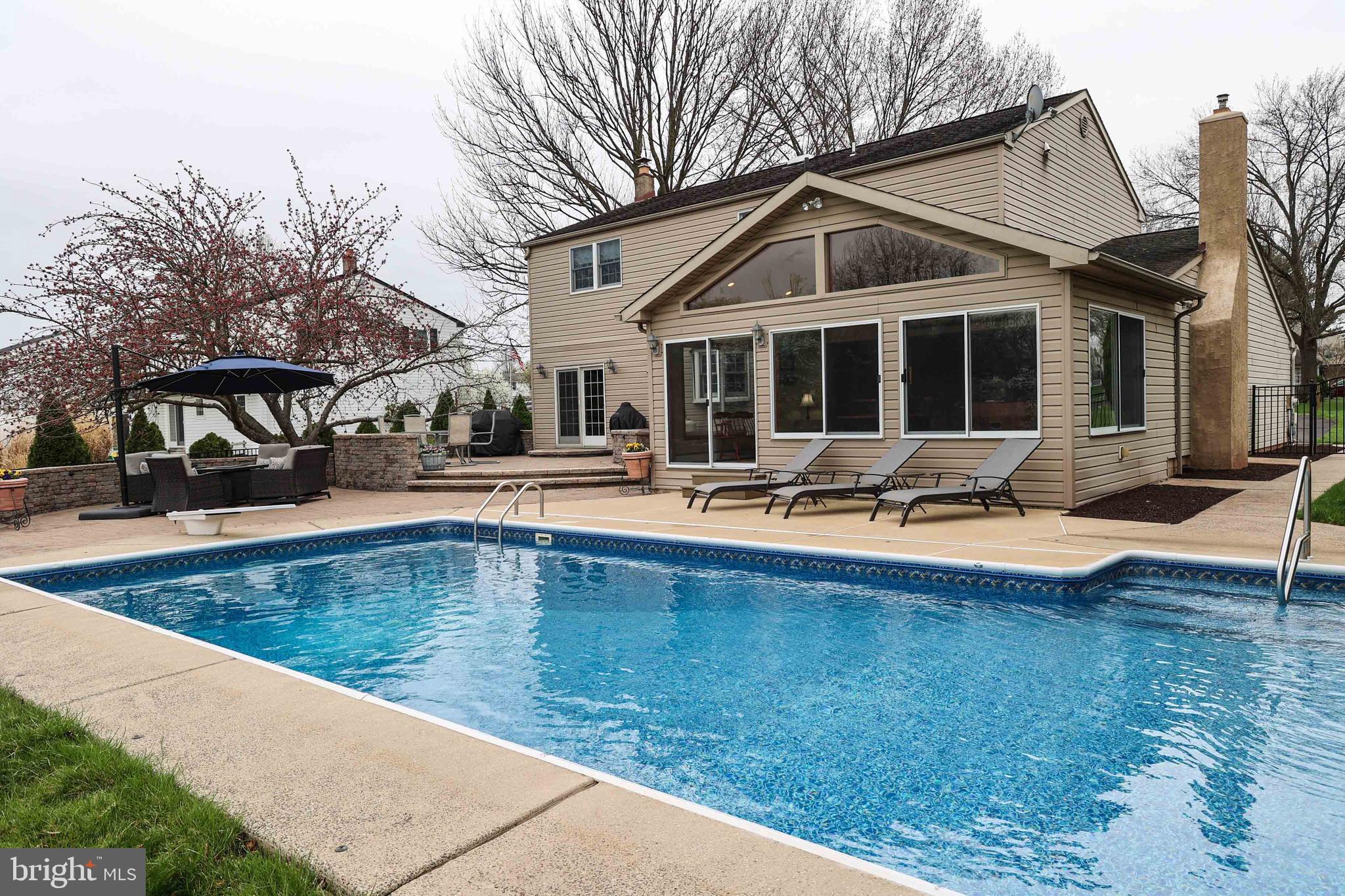 1954 Lafayette Road Lansdale, PA 19446 - Photo 12 of 29 Back yard pool with concrete decking
