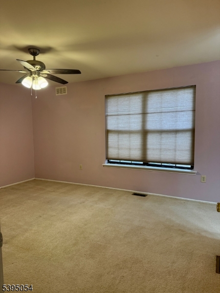92 Winchester Way Somerset, NJ 08873 - Photo 15 of 19 a view of an empty room with a window