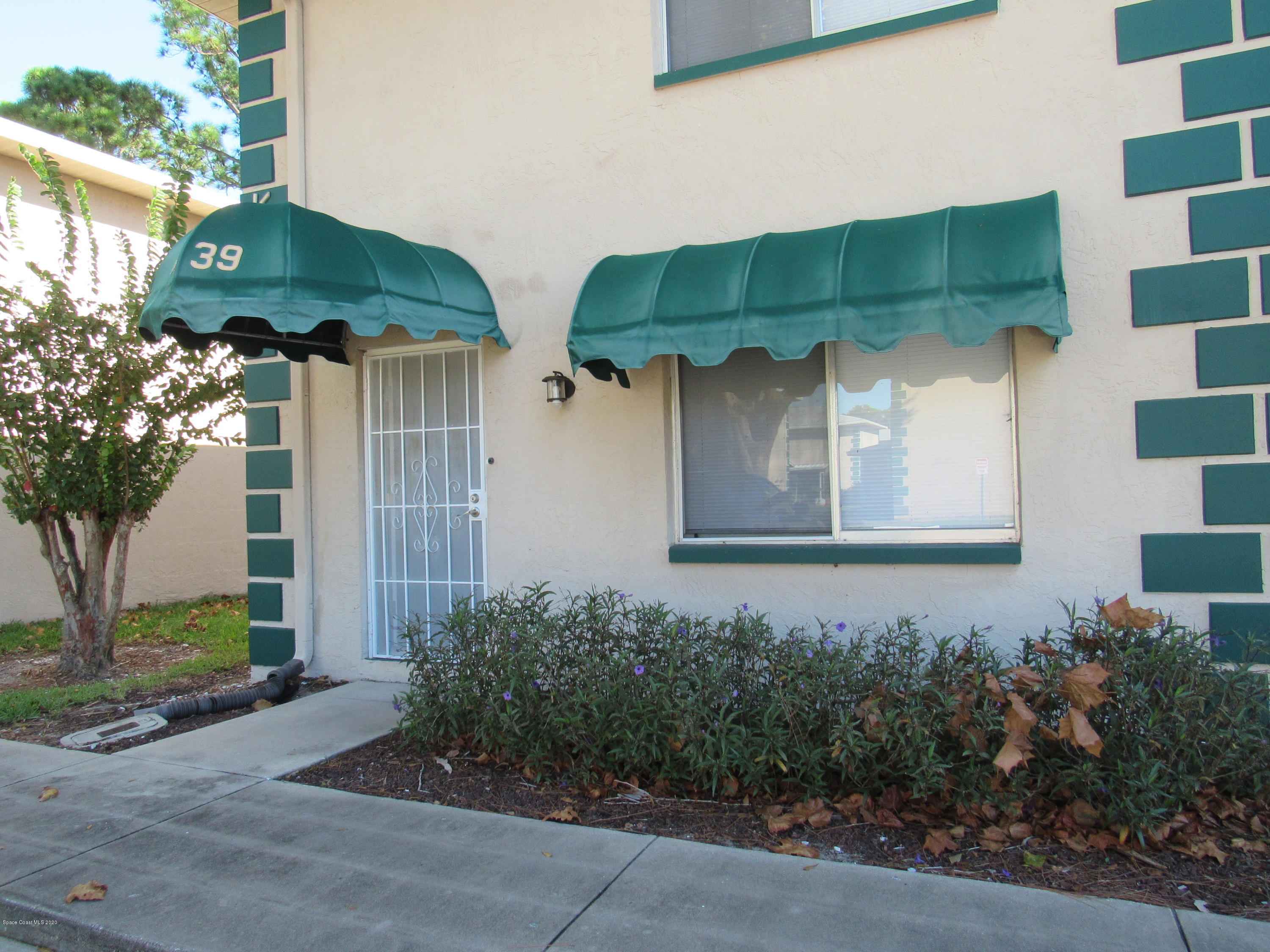 1882 Murrell Road, Unit 39 Rockledge, FL 32955 - Photo 2 of 15 front of bldg