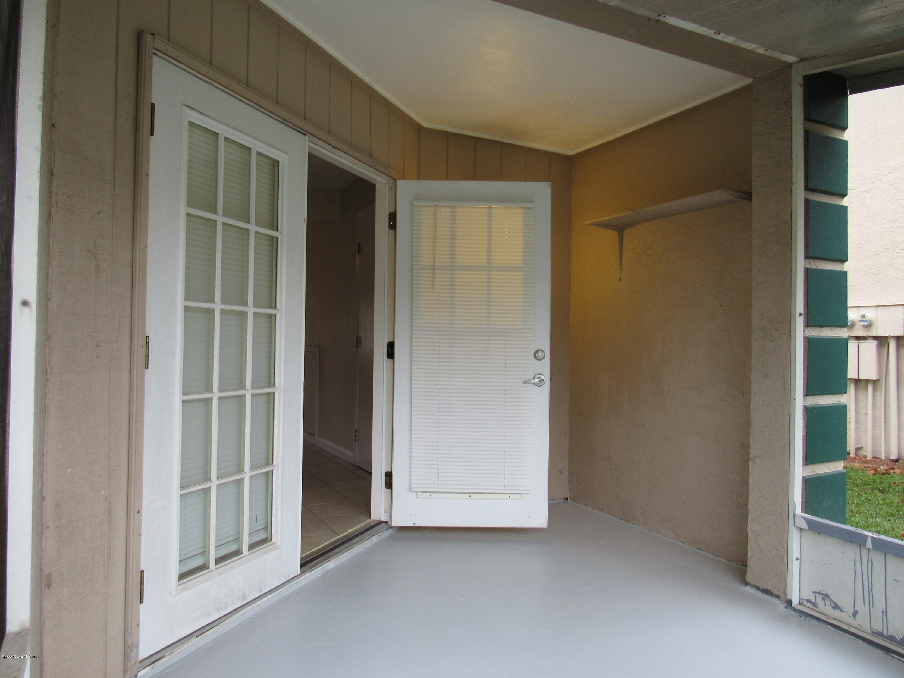 1882 Murrell Road, Unit 39 Rockledge, FL 32955 - Photo 11 of 15 screened in patio