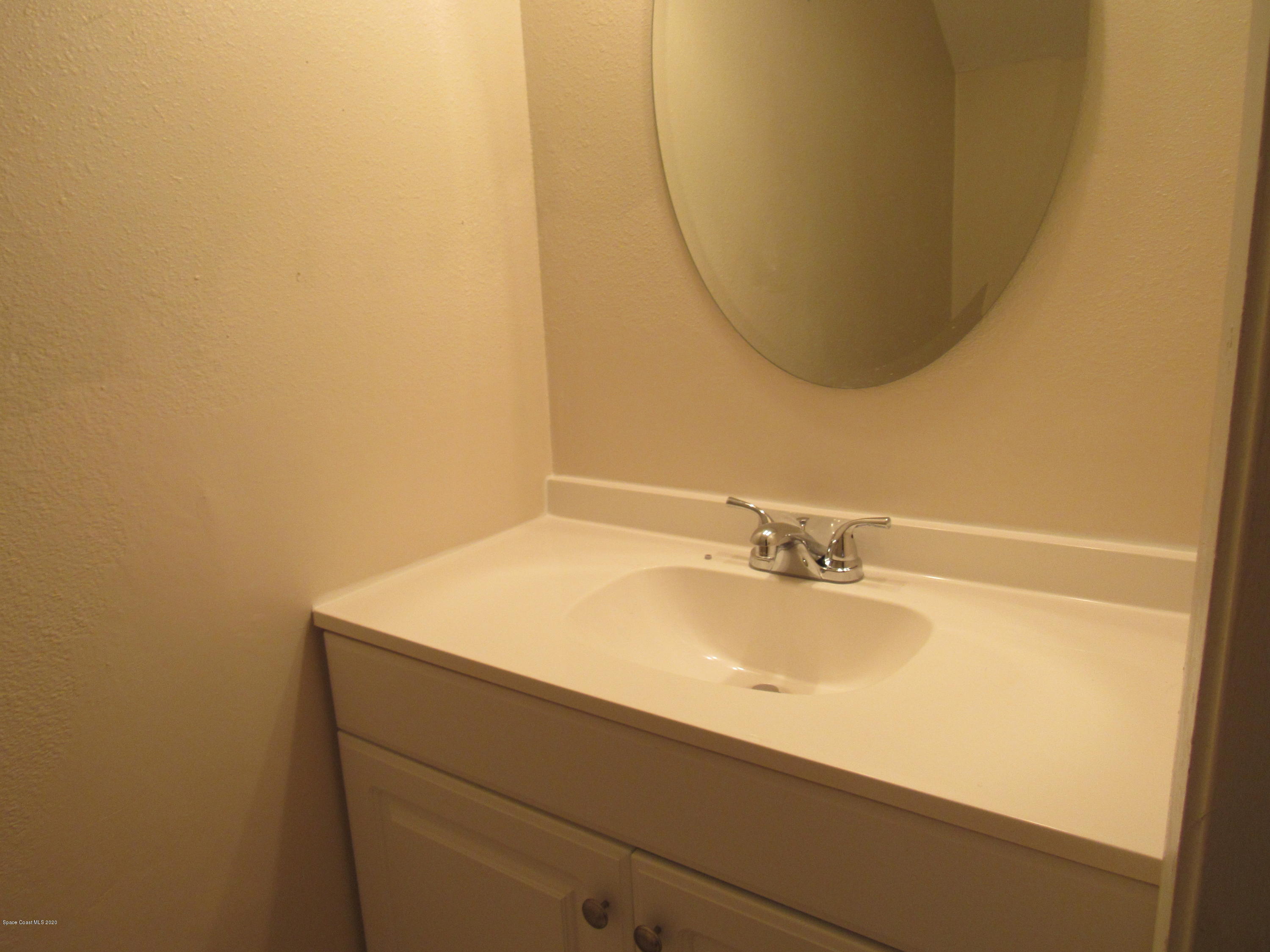 1882 Murrell Road, Unit 39 Rockledge, FL 32955 - Photo 14 of 15 half bath first floor