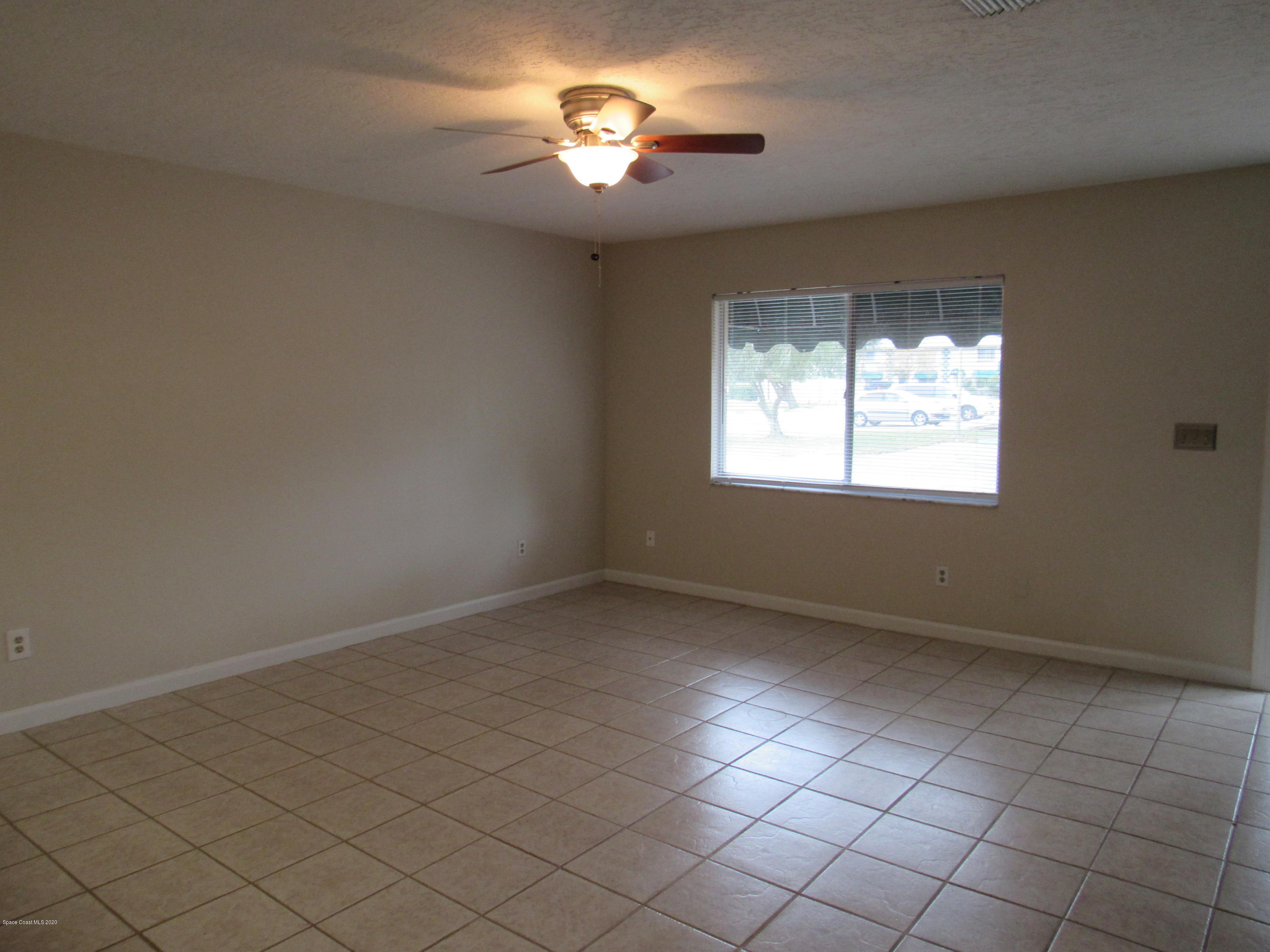1882 Murrell Road, Unit 39 Rockledge, FL 32955 - Photo 10 of 15 Open tiled living room Floor Plan