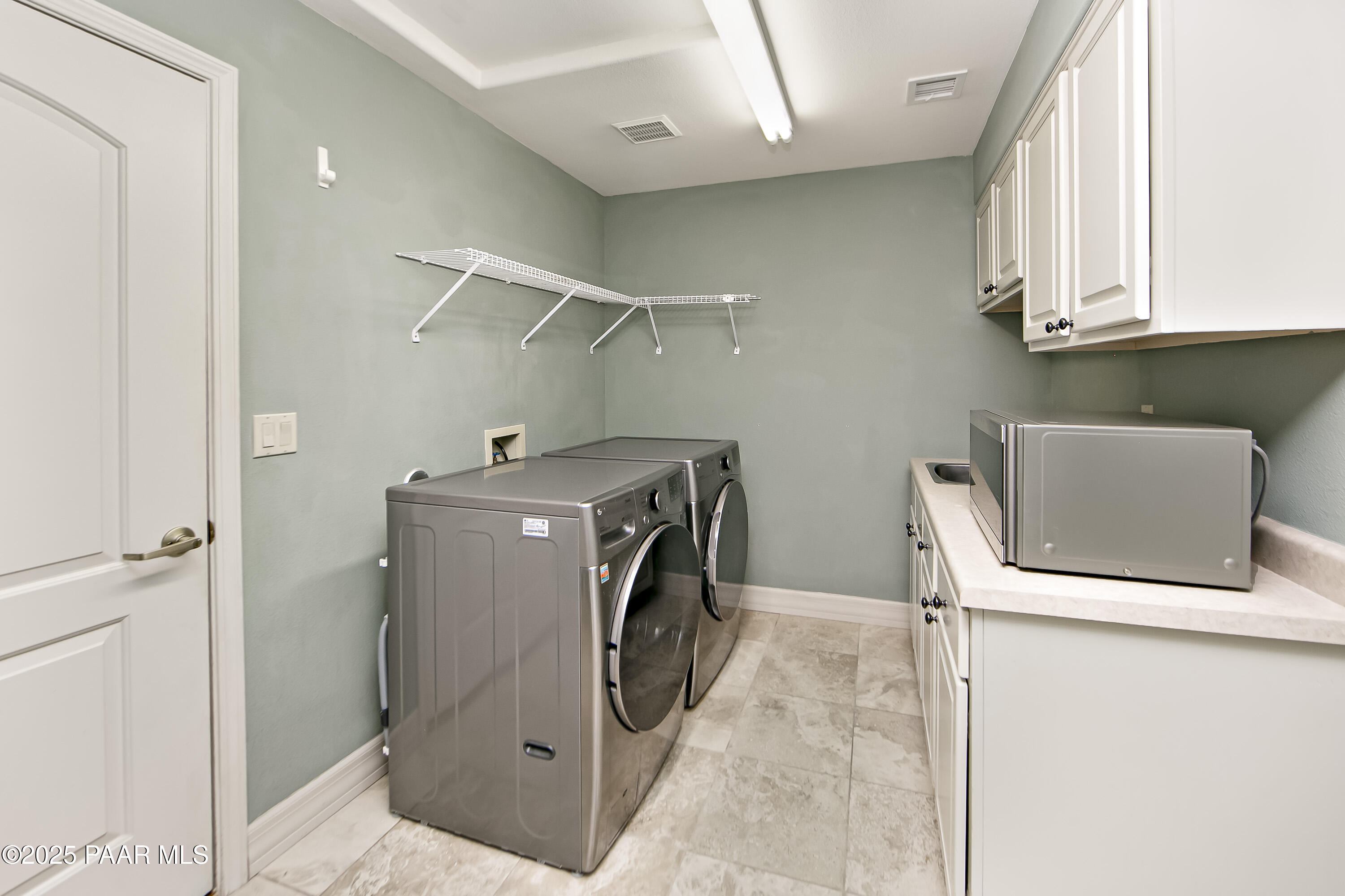 1905 Timber Point West Prescott, AZ 86303 - Photo 16 of 27 a utility room with dryer and washer