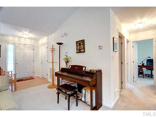 502 Windcrest Road Durham, NC 27713 - Photo 2 of 21 The side panel window of the front door allows natural, filtered ight in to the home. Foyer