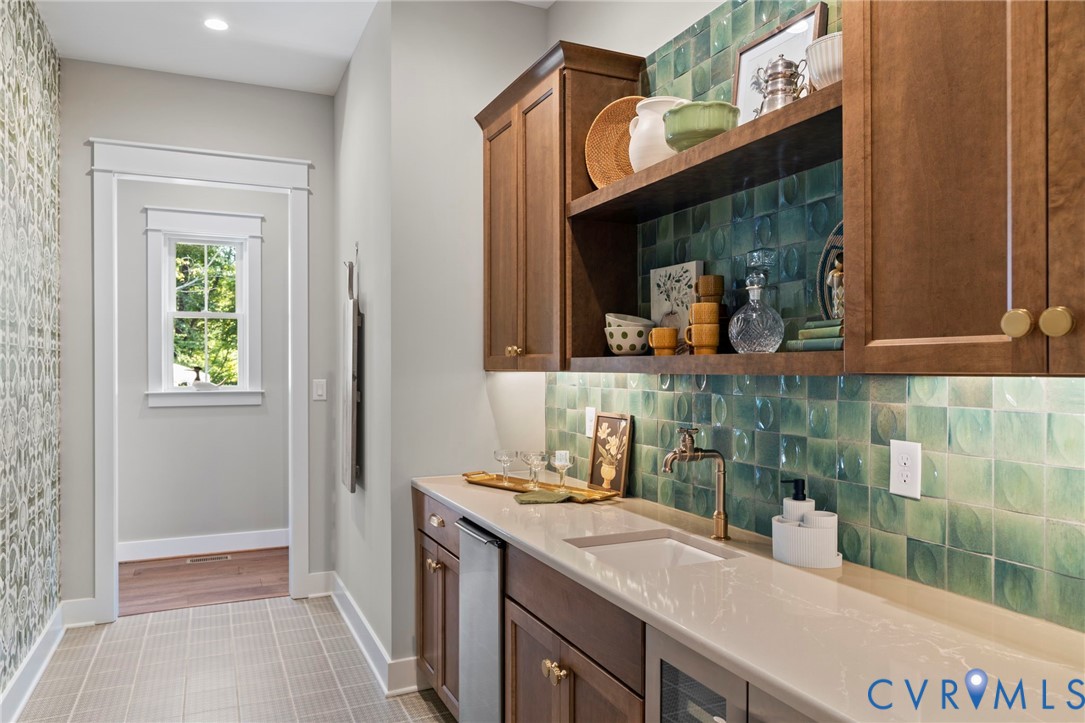 4764 Gooden Trail Quinton, VA 23141 - Photo 12 of 50 Bar featuring open shelves, light stone counters,