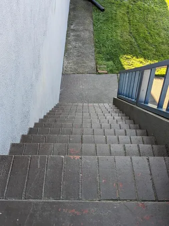 a view of wooden floor in front of gate