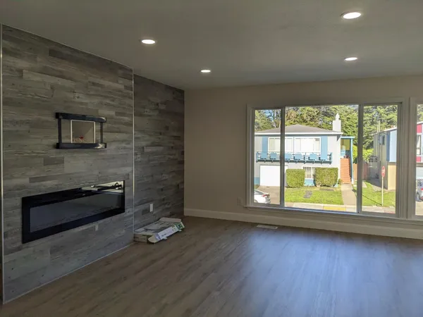 a room with window and wooden floor