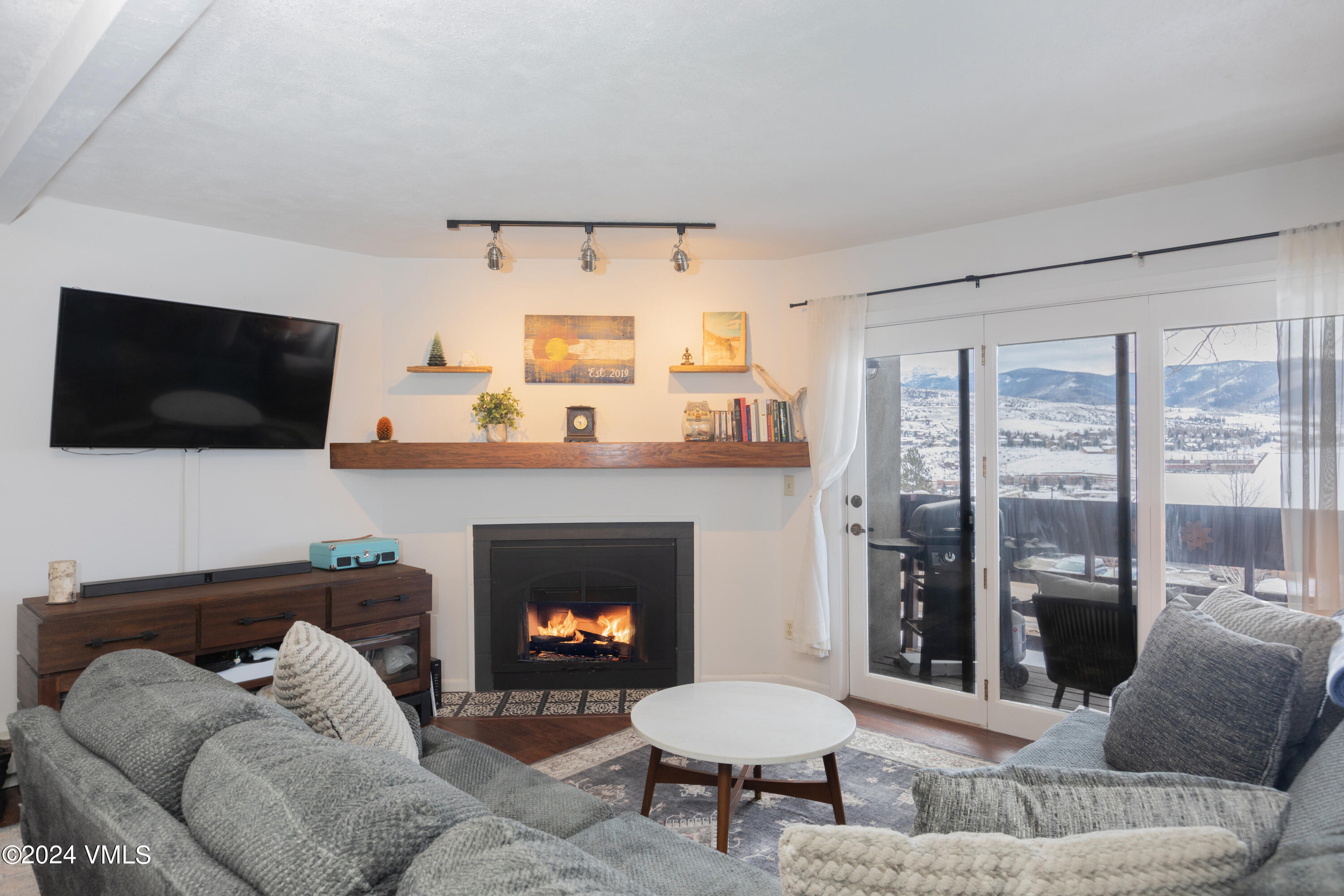 333 Beard Creek Road, Unit A203 Edwards, CO 81632 - Photo 1 of 10 LIving Room / Deck