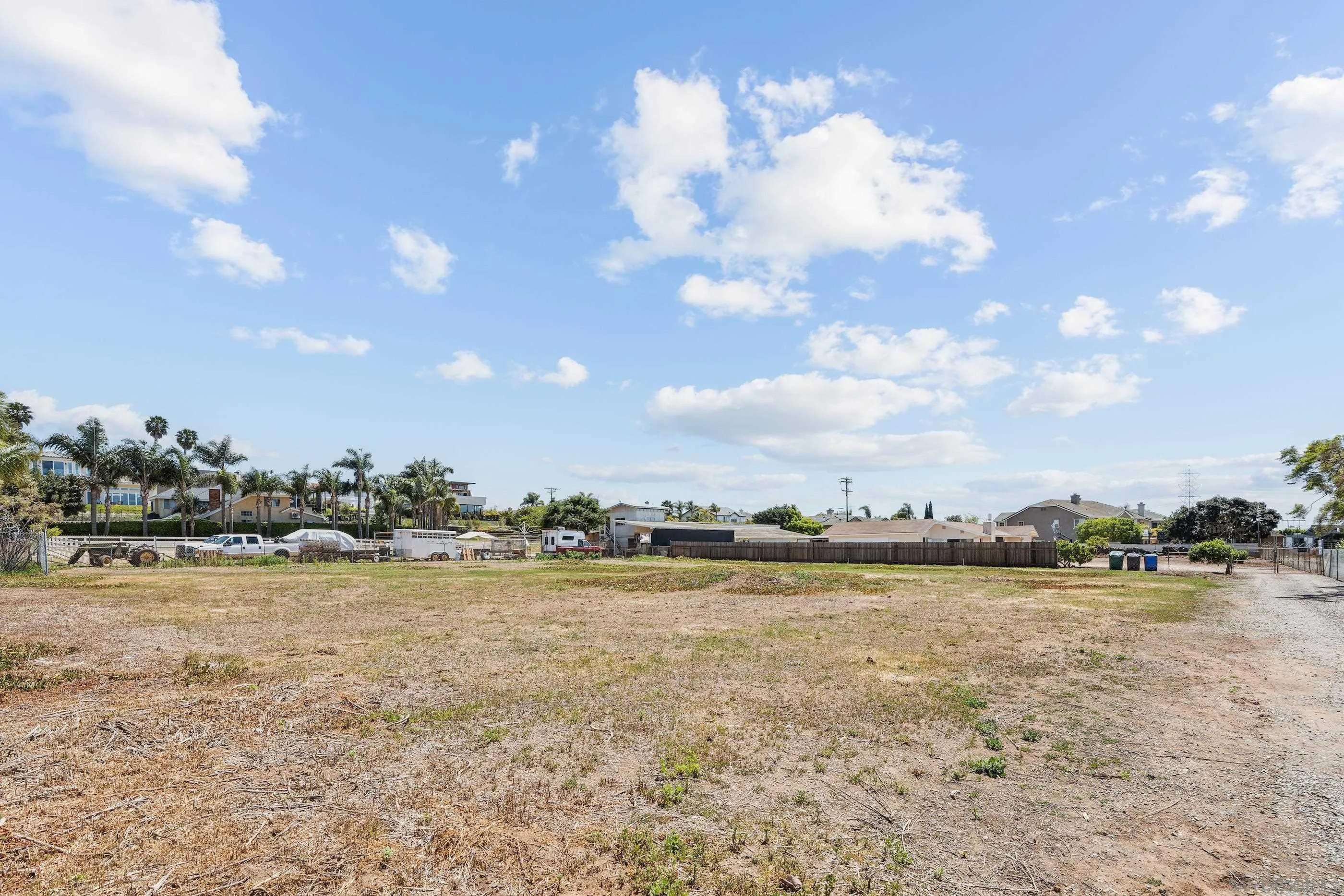 1587 Triton Street Carlsbad, CA 92011 - Photo 8 of 10 a view of a lake with houses in the back