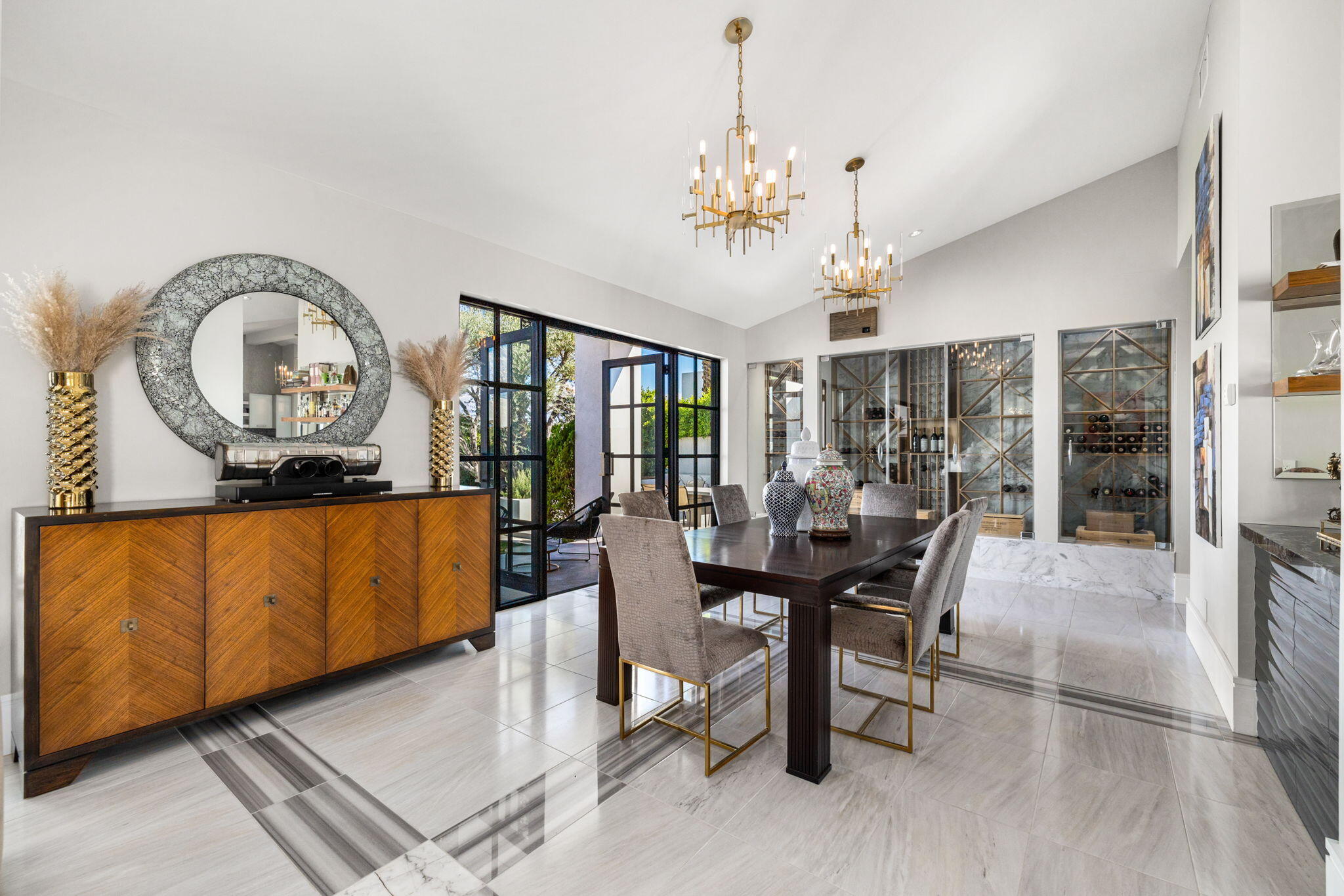 70481 Placerville Road Rancho Mirage, CA 92270 - Photo 11 of 42 a view of a dining room with furniture and chandelier