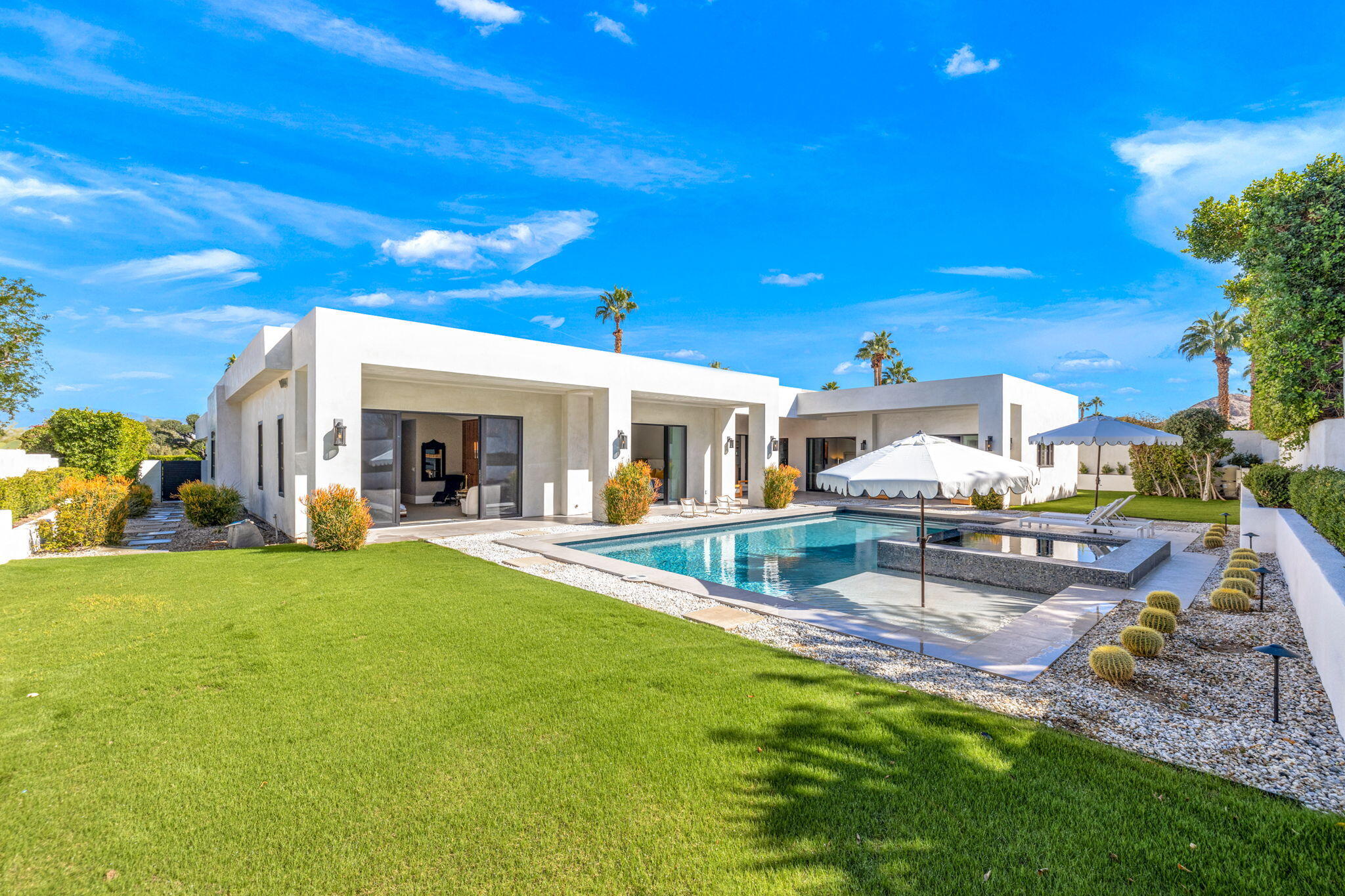 70481 Placerville Road Rancho Mirage, CA 92270 - Photo 2 of 42 a view of a house with backyard porch and sitting area