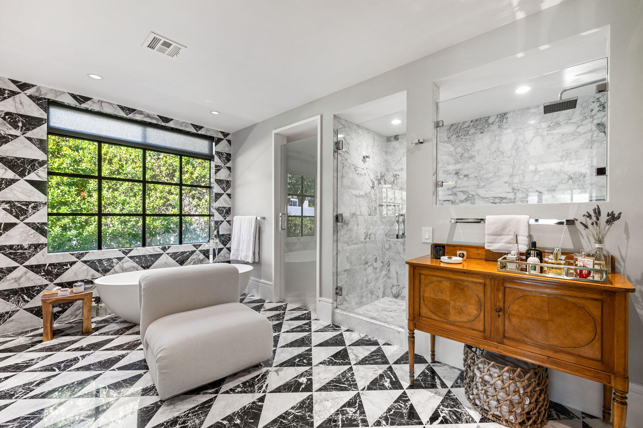 70481 Placerville Road Rancho Mirage, CA 92270 - Photo 29 of 42 a spacious bathroom with a double vanity sink a mirror and a shower
