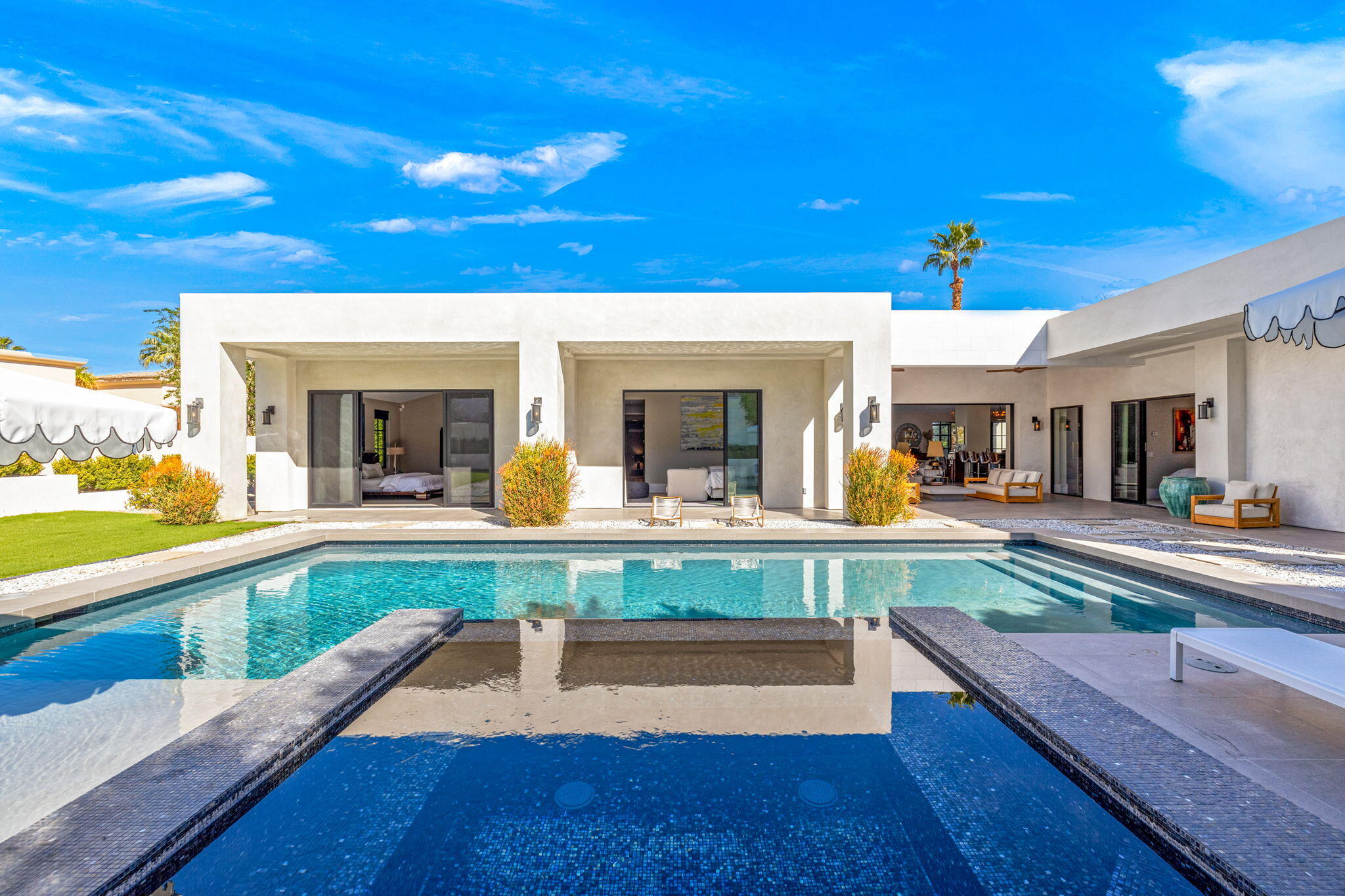70481 Placerville Road Rancho Mirage, CA 92270 - Photo 3 of 42 a view of living room with kitchen island furniture and a chandelier