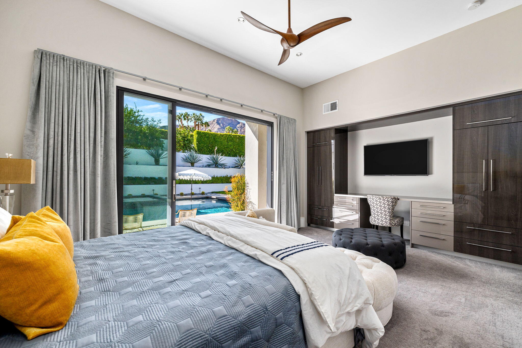 70481 Placerville Road Rancho Mirage, CA 92270 - Photo 31 of 42 a bedroom with a bed outdoor view and a large window