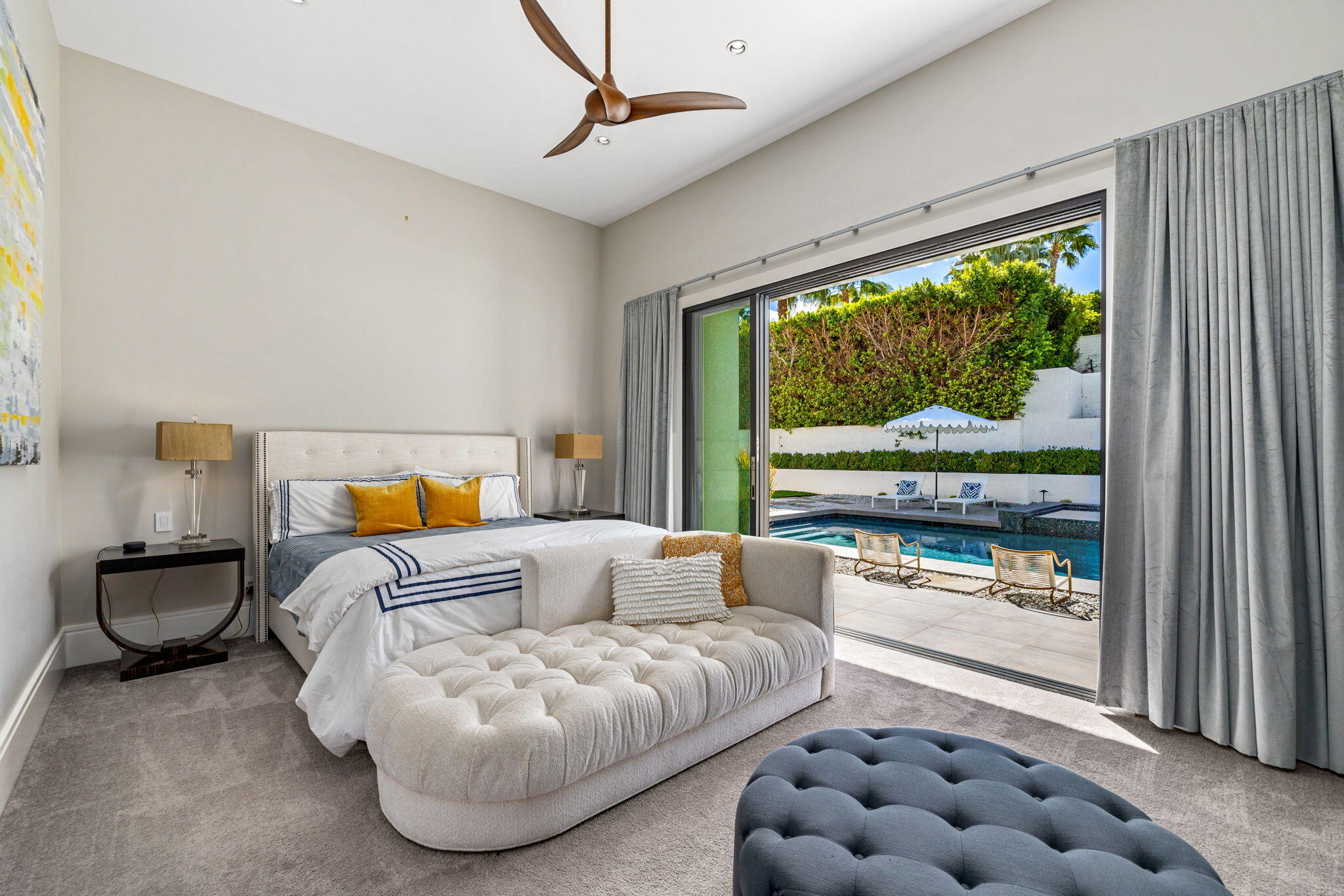 70481 Placerville Road Rancho Mirage, CA 92270 - Photo 32 of 42 a bedroom with furniture and a large window