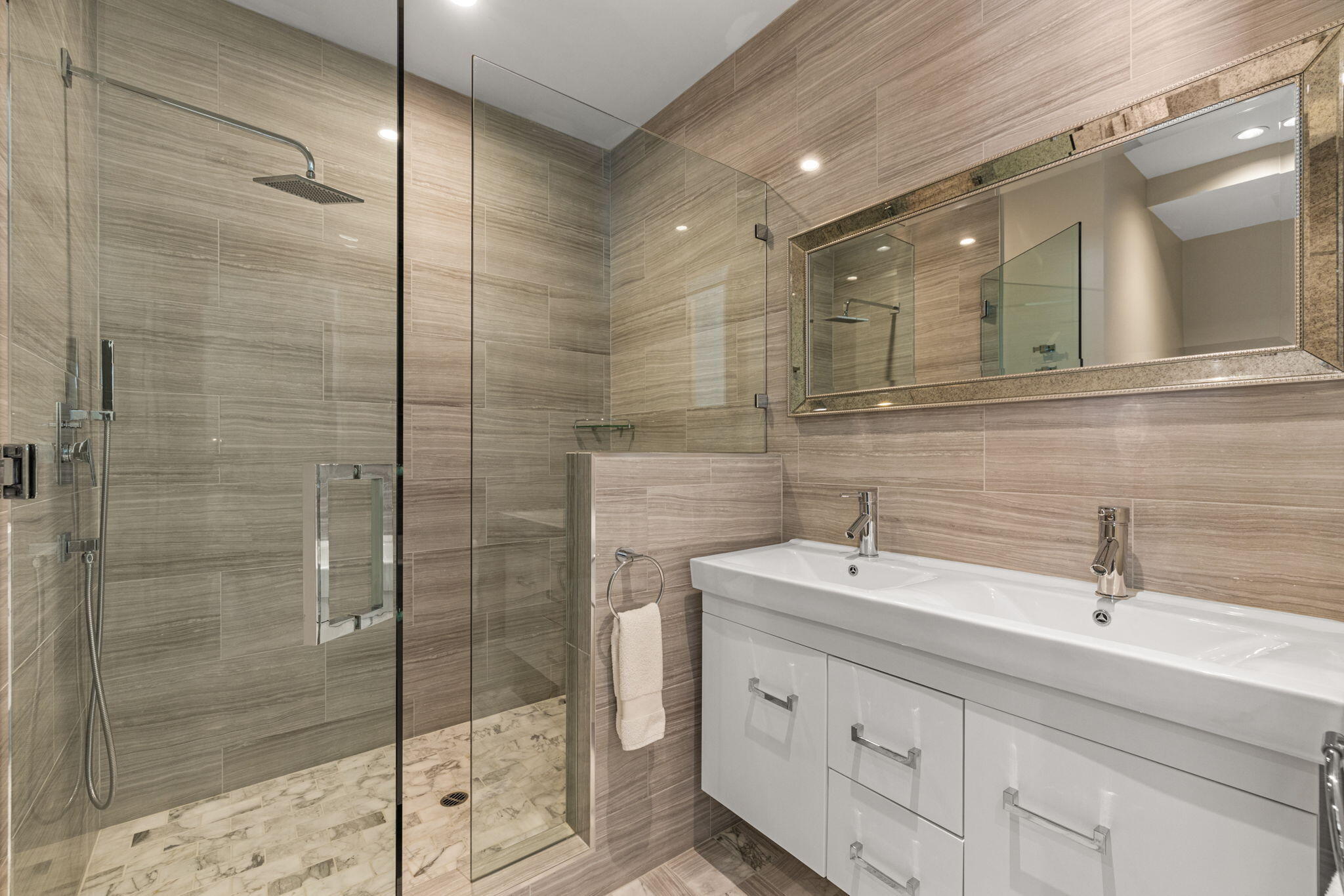 70481 Placerville Road Rancho Mirage, CA 92270 - Photo 33 of 42 a bathroom with a double vanity sink mirror and shower