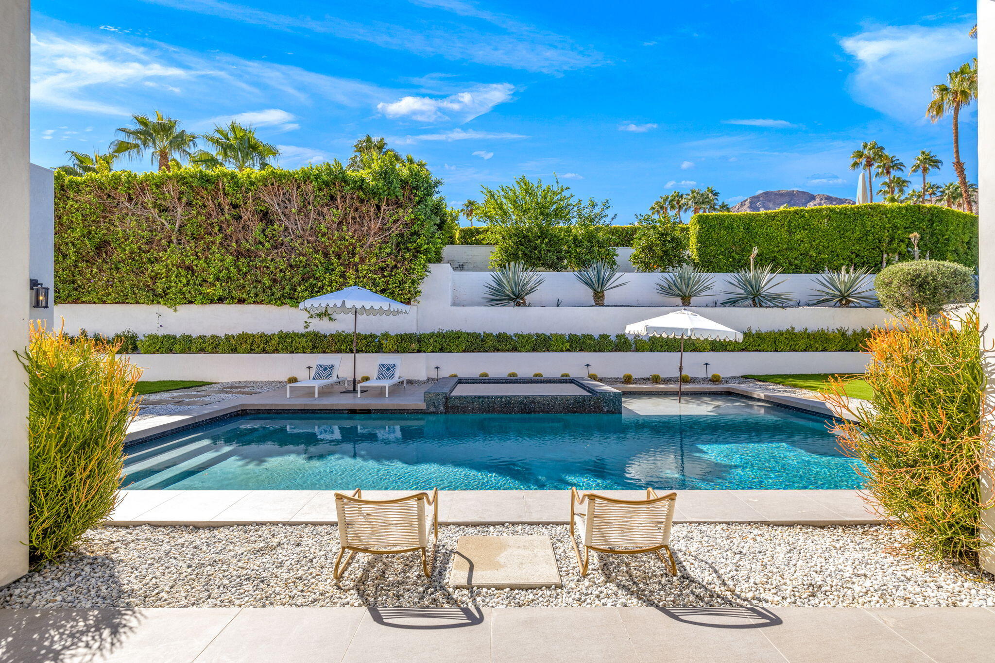 70481 Placerville Road Rancho Mirage, CA 92270 - Photo 4 of 42 a view of a swimming pool with a patio