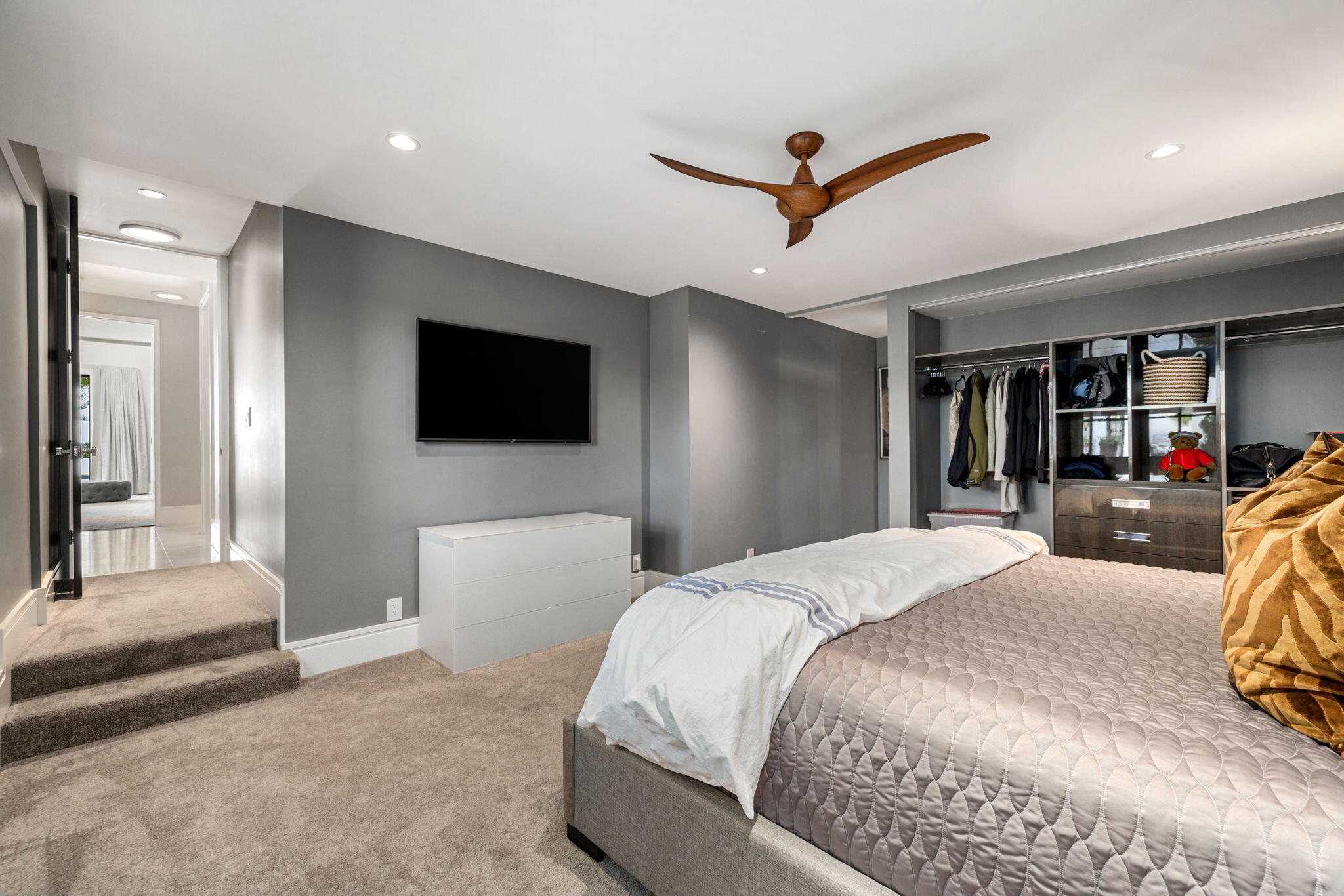 70481 Placerville Road Rancho Mirage, CA 92270 - Photo 41 of 42 a spacious bedroom with a bed and a flat screen tv