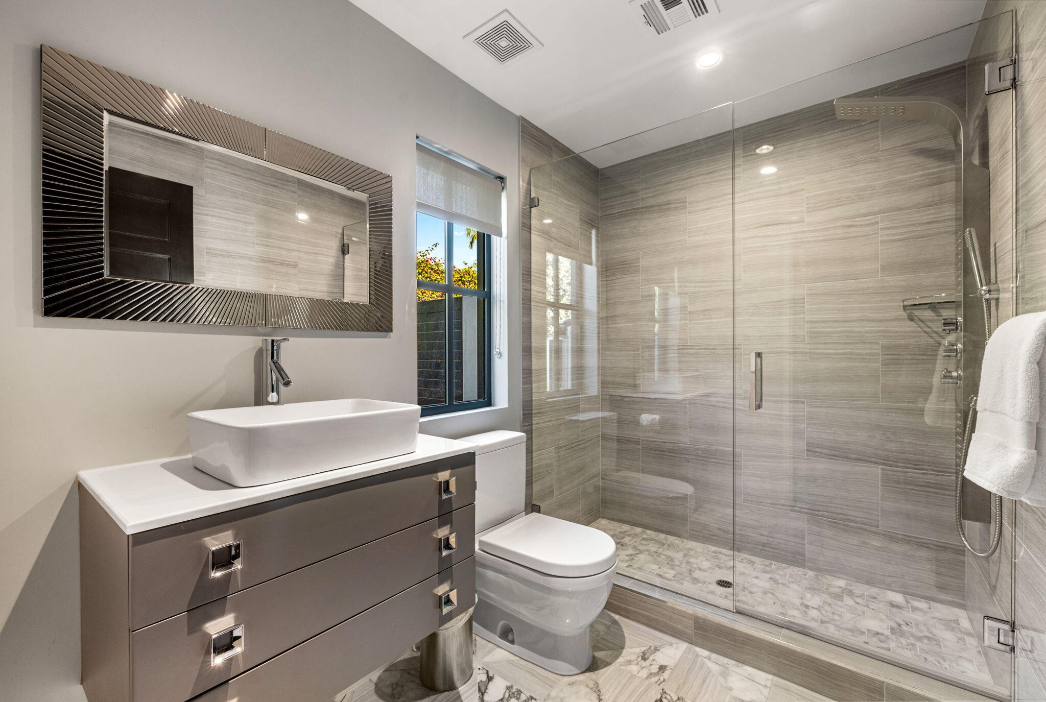 70481 Placerville Road Rancho Mirage, CA 92270 - Photo 42 of 42 a bathroom with a sink toilet a mirror and shower