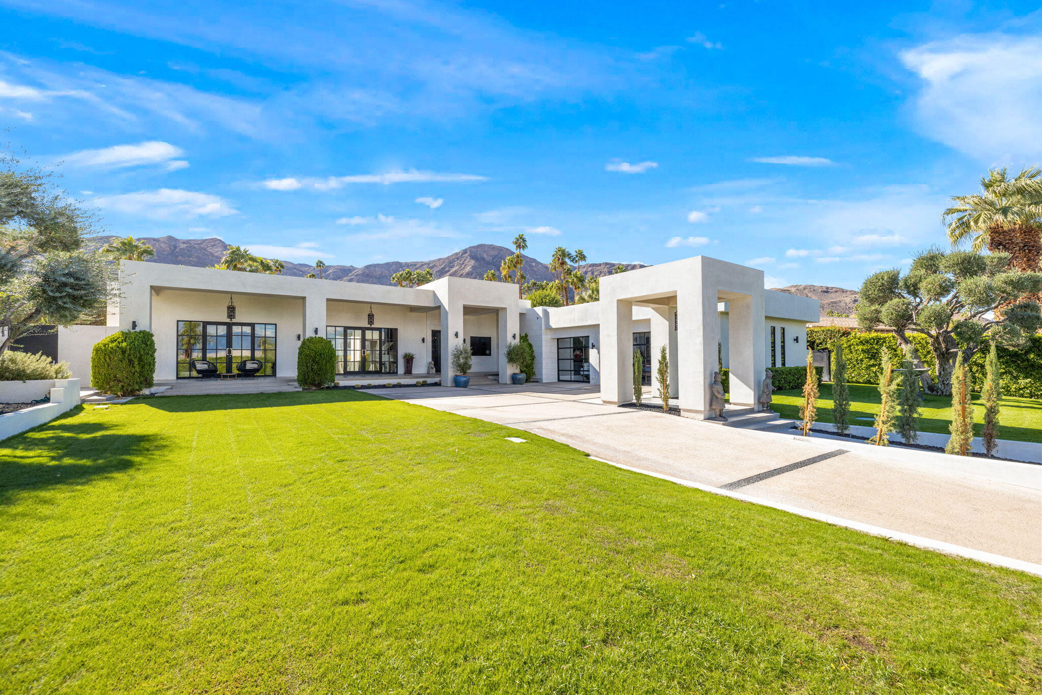 70481 Placerville Road Rancho Mirage, CA 92270 - Photo 6 of 42 a front view of house with yard and swimming pool
