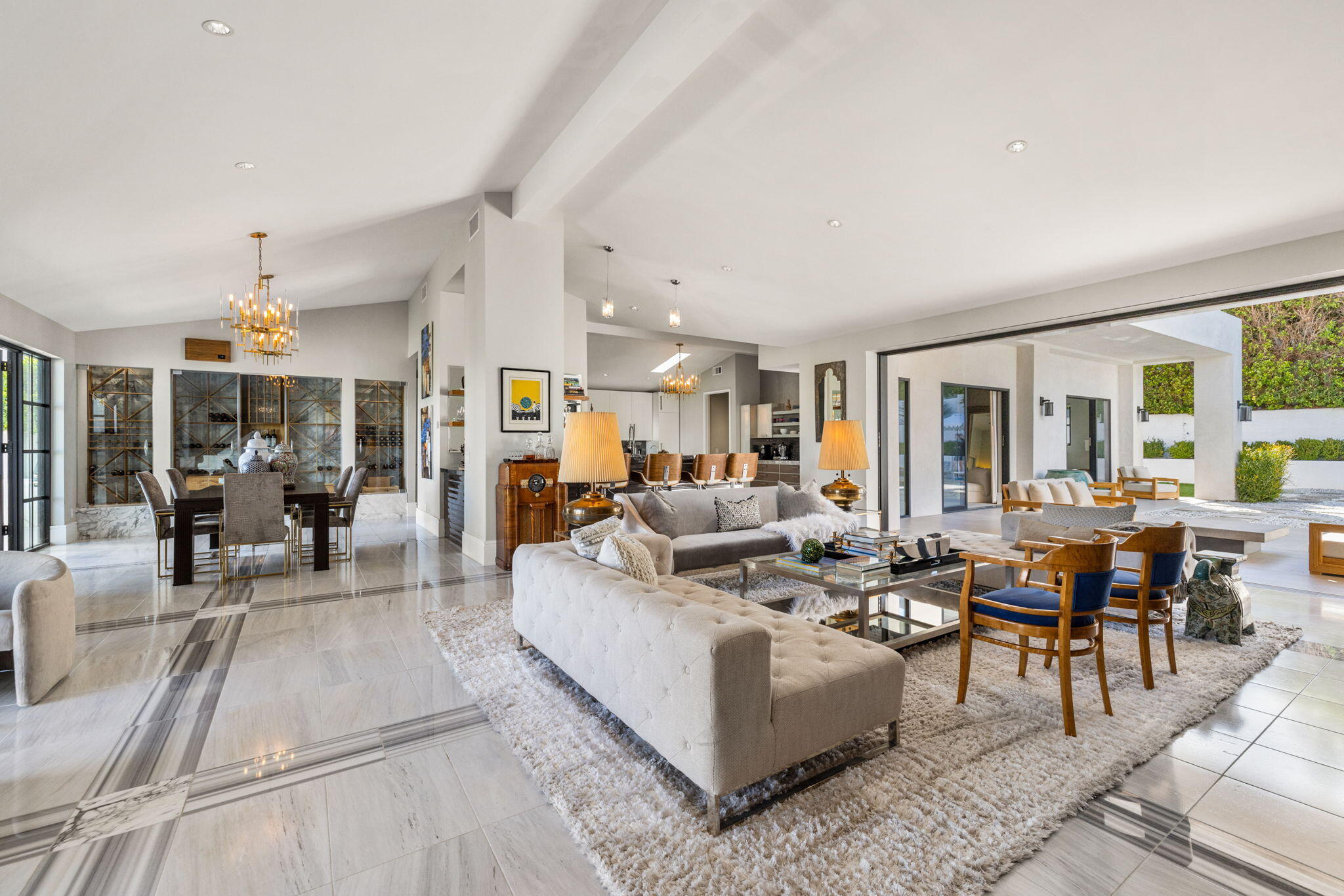 70481 Placerville Road Rancho Mirage, CA 92270 - Photo 10 of 42 a living room with lots of furniture and a table
