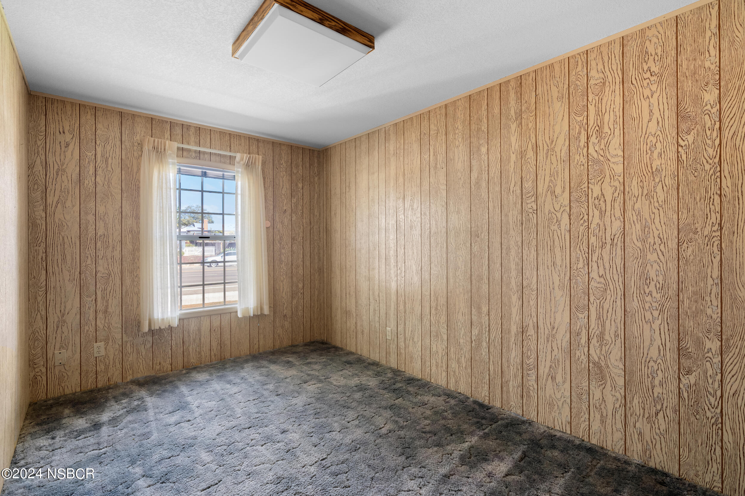 4188 Constellation Road Lompoc, CA 93436 - Photo 14 of 37 a view of an empty room with a window