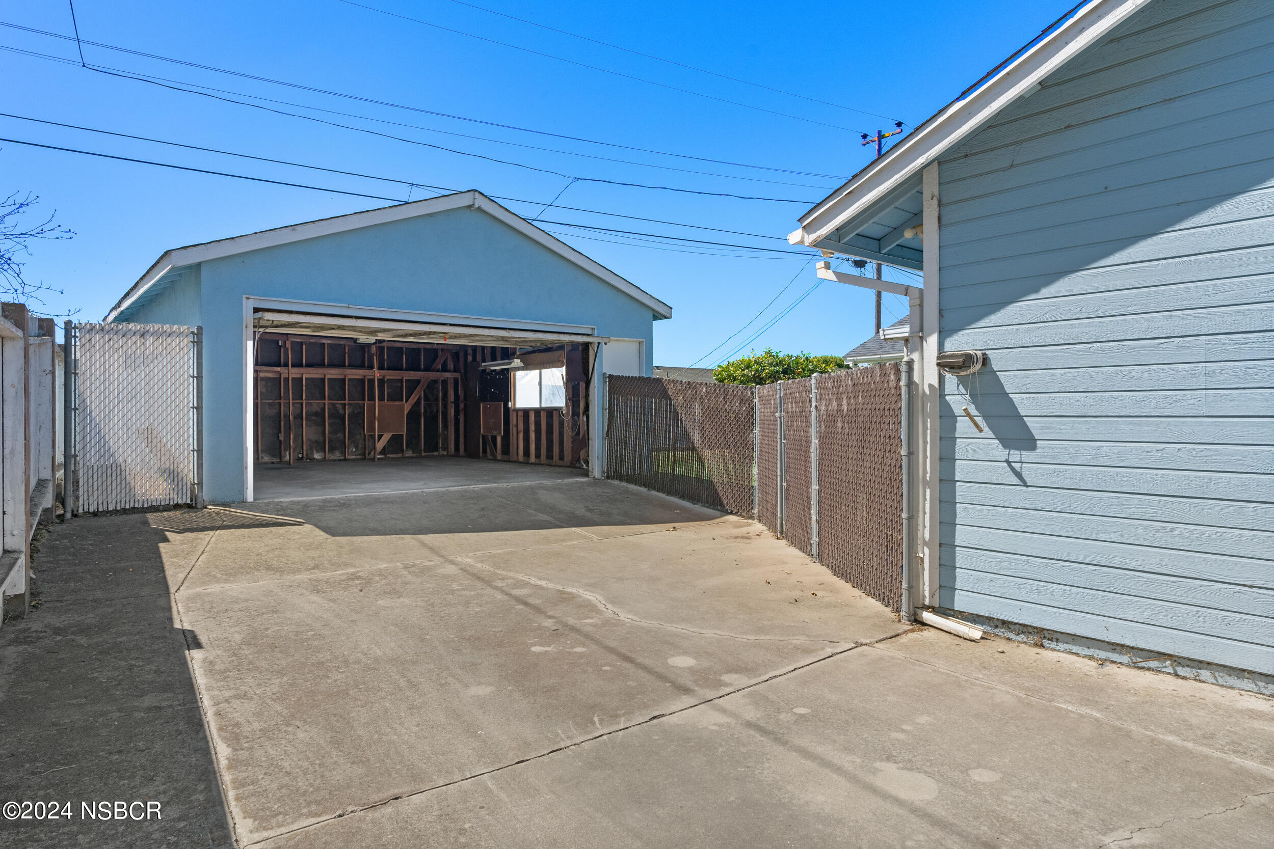 4188 Constellation Road Lompoc, CA 93436 - Photo 24 of 37 a front view of a house with a garage