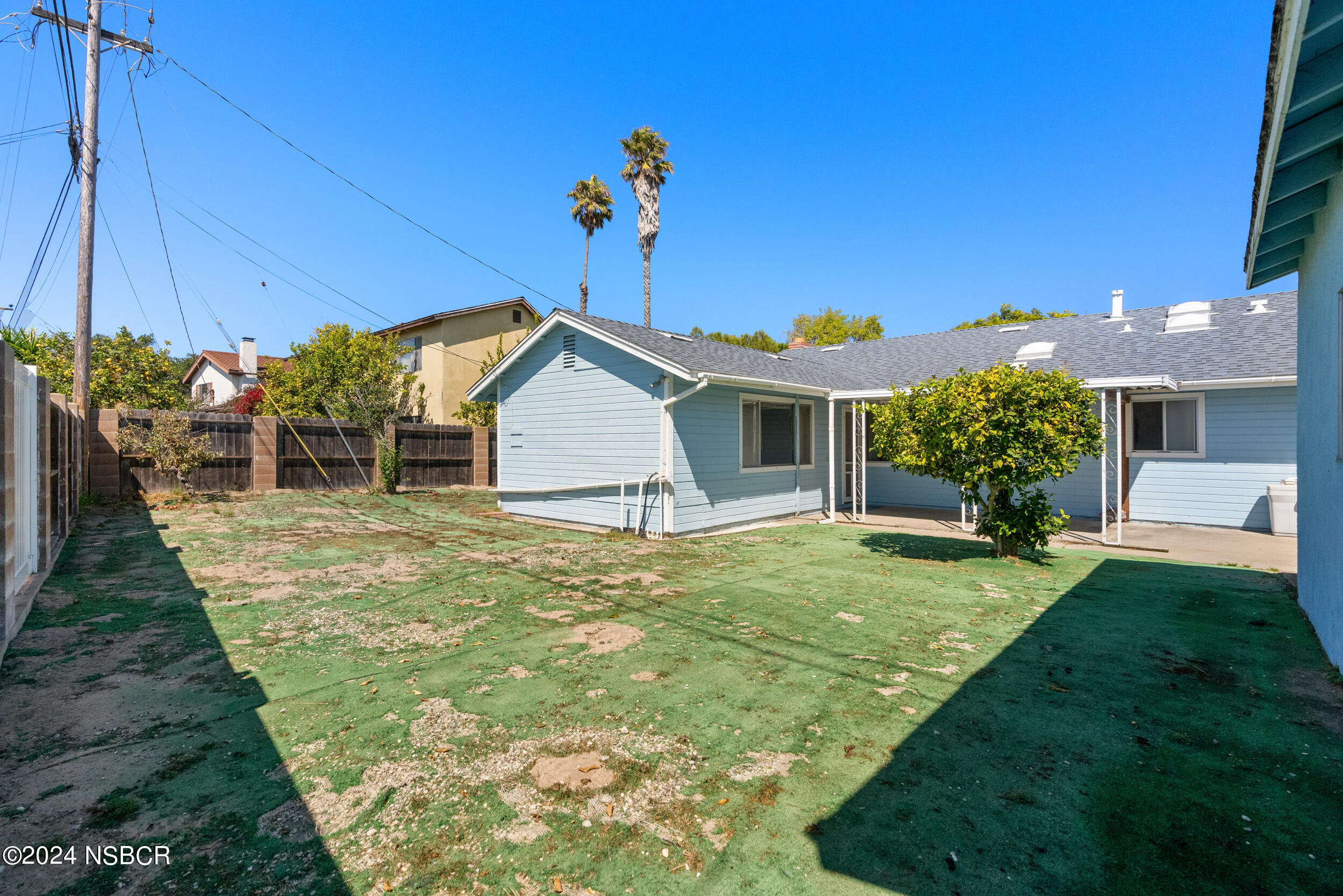 4188 Constellation Road Lompoc, CA 93436 - Photo 29 of 37 a front view of a house with a yard