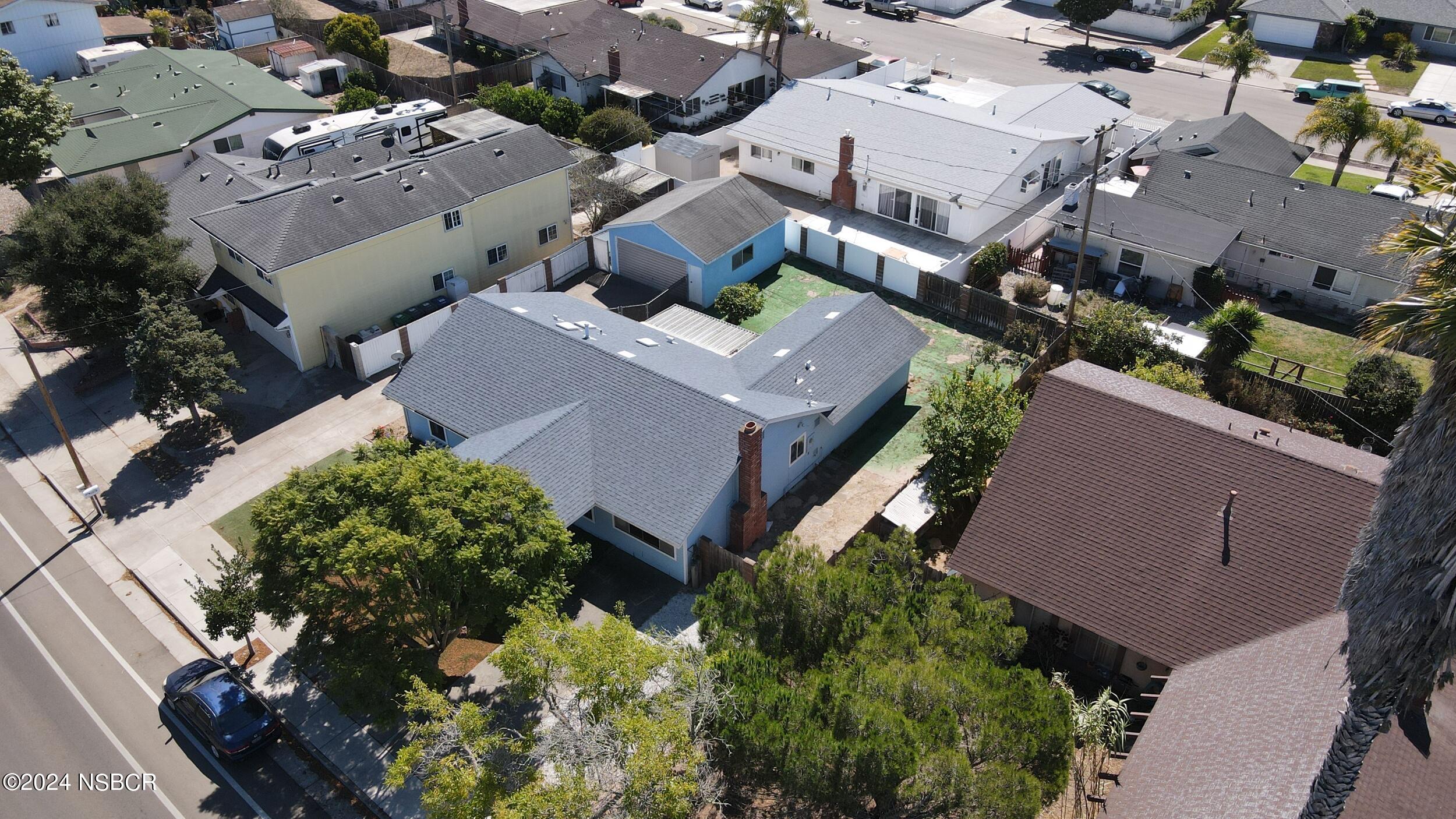 4188 Constellation Road Lompoc, CA 93436 - Photo 33 of 37 an aerial view of a house with a yard