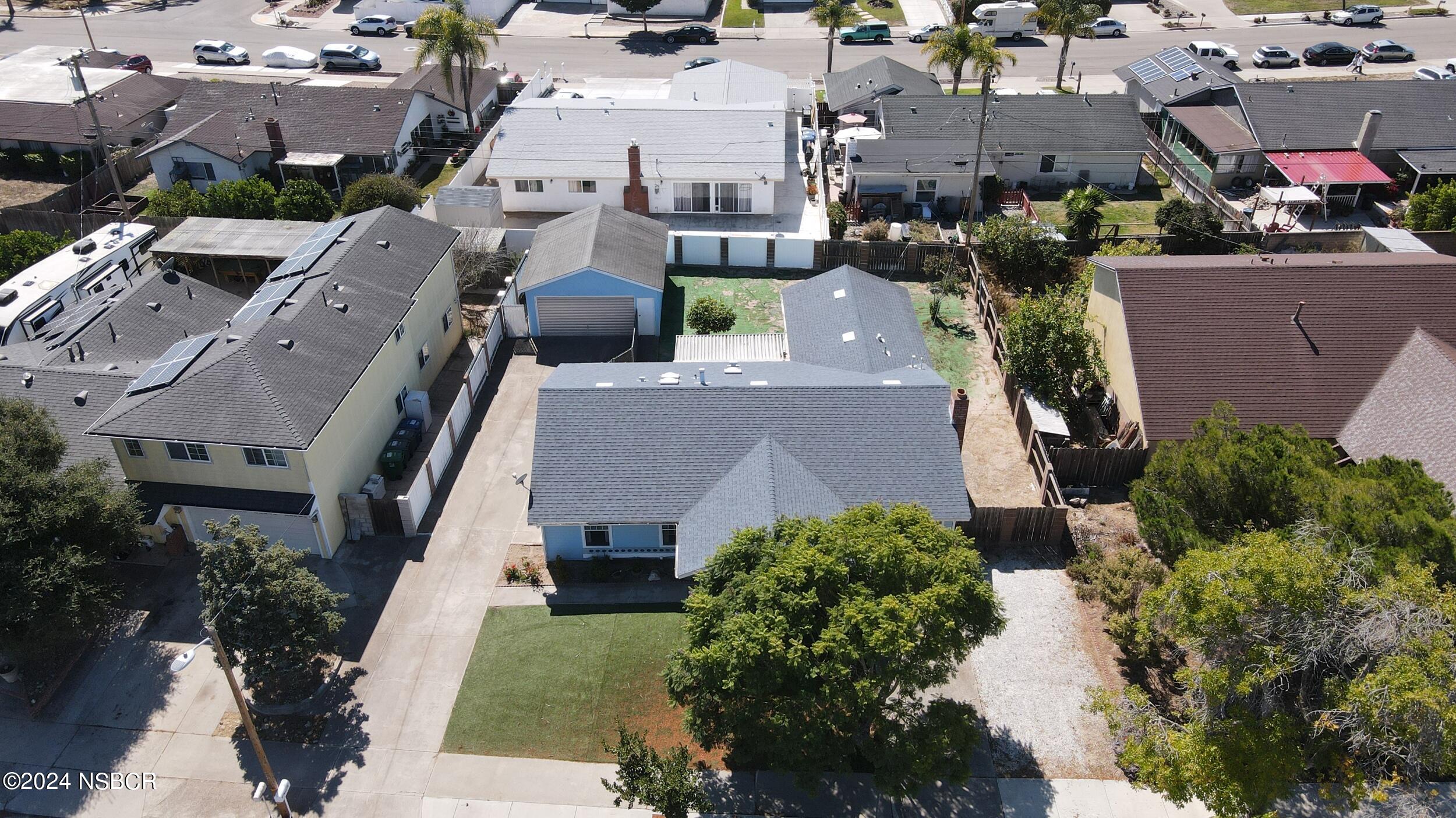 4188 Constellation Road Lompoc, CA 93436 - Photo 34 of 37 an aerial view of multiple houses with yard