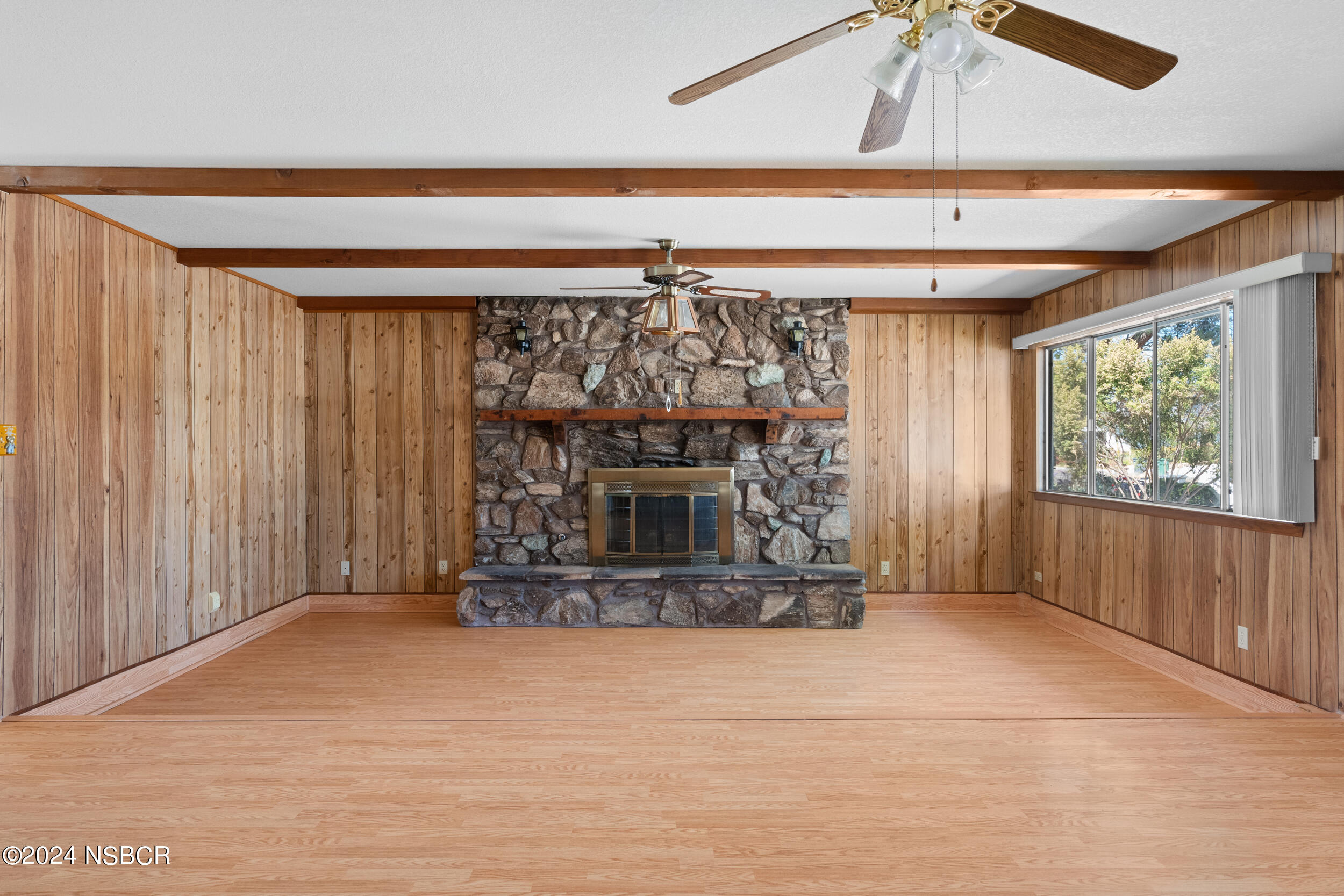 4188 Constellation Road Lompoc, CA 93436 - Photo 7 of 37 a view of a livingroom with a fireplace and window