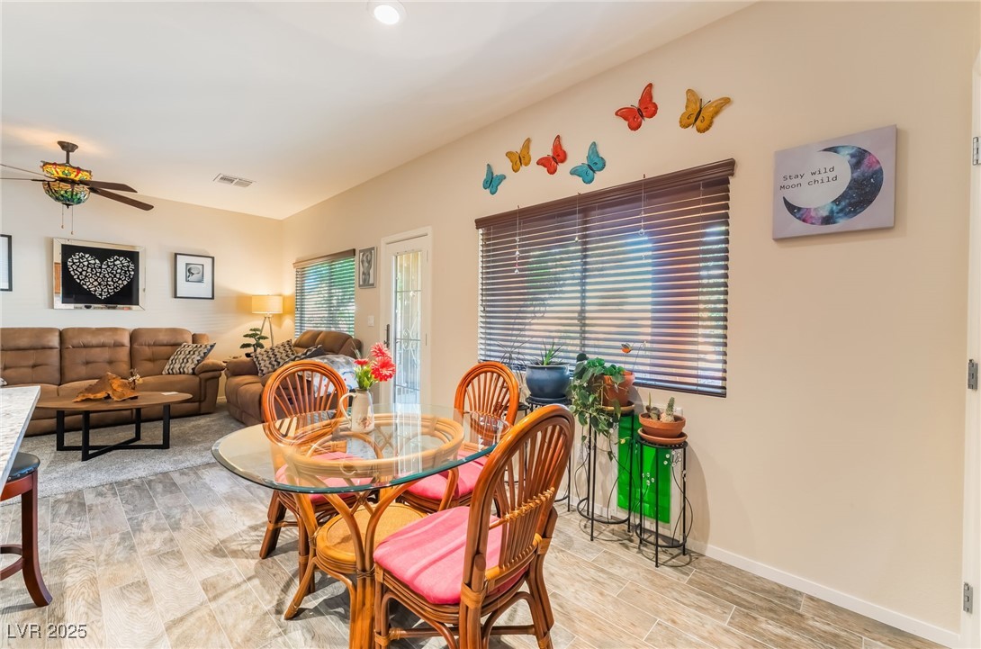4732 Adriano Way Pahrump, NV 89061 - Photo 20 of 44 Dining room with light wood-style flooring and a ceiling fan