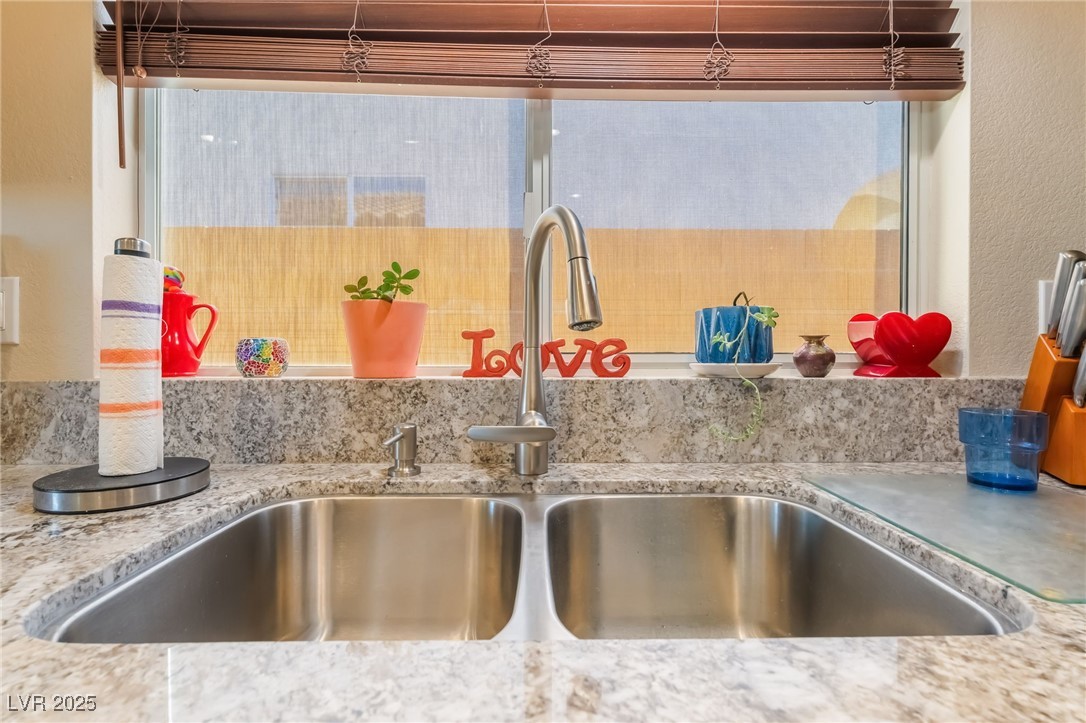 4732 Adriano Way Pahrump, NV 89061 - Photo 22 of 44 Kitchen view of a sink and a textured wall