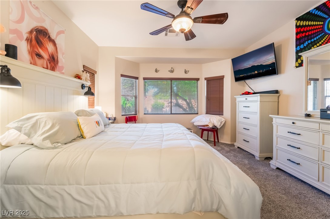 4732 Adriano Way Pahrump, NV 89061 - Photo 27 of 44 Carpeted bedroom featuring ceiling fan