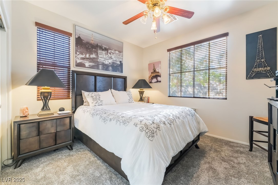 4732 Adriano Way Pahrump, NV 89061 - Photo 31 of 44 Bedroom with carpet floors and ceiling fan
