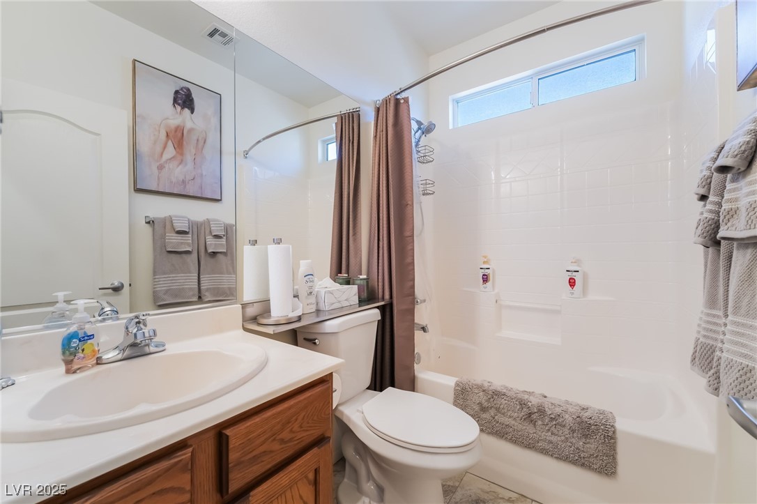 4732 Adriano Way Pahrump, NV 89061 - Photo 33 of 44 Bathroom featuring shower / bath combo and vanity